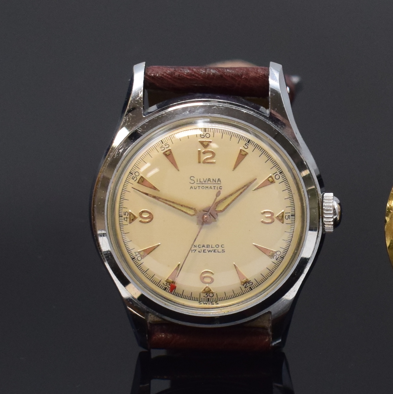 Detail a: JUVENIA/SILVANA 2 nahezu neuwertige Armbanduhren mit Hammerautomatik, Schweiz um 1950, verschr. Geh. m. Stahlboden, 1) JUVENIA, verg. Geh., silb. ...