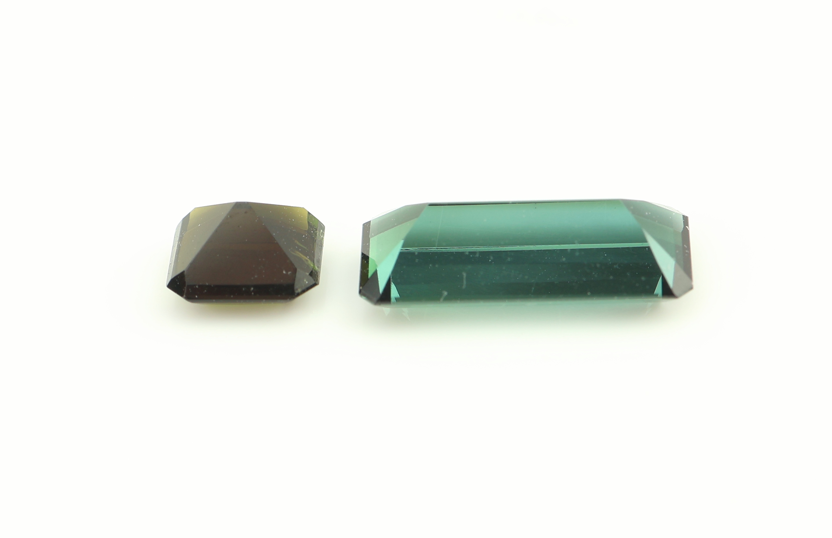 Detail b: Lot 13 Turmaline zus. ca. 13.9 ct, versch. Grüntöne, versch. Schliffformen