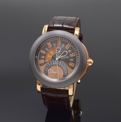 Image GÉRALD GENTA Arena Bi-Retro big and heavy gents wristwatch in pink gold 18k/tantalum, Switzerland around 2020, self winding, on both sides glazed case reference BSP.Y.55, satin-finished tantalum-bezel, back with 8 screws, silver-gray dial with ray-engine- turned ground, retrogrades date at 6, digital hour at 12, central second as well as retrograde minute, nickel plated movement calibre 1000, 27 jewels, 5 adjustments, original leather strap with heavy deployant clasp in pink gold 18k, diameter approx. 45 mm, condition 2