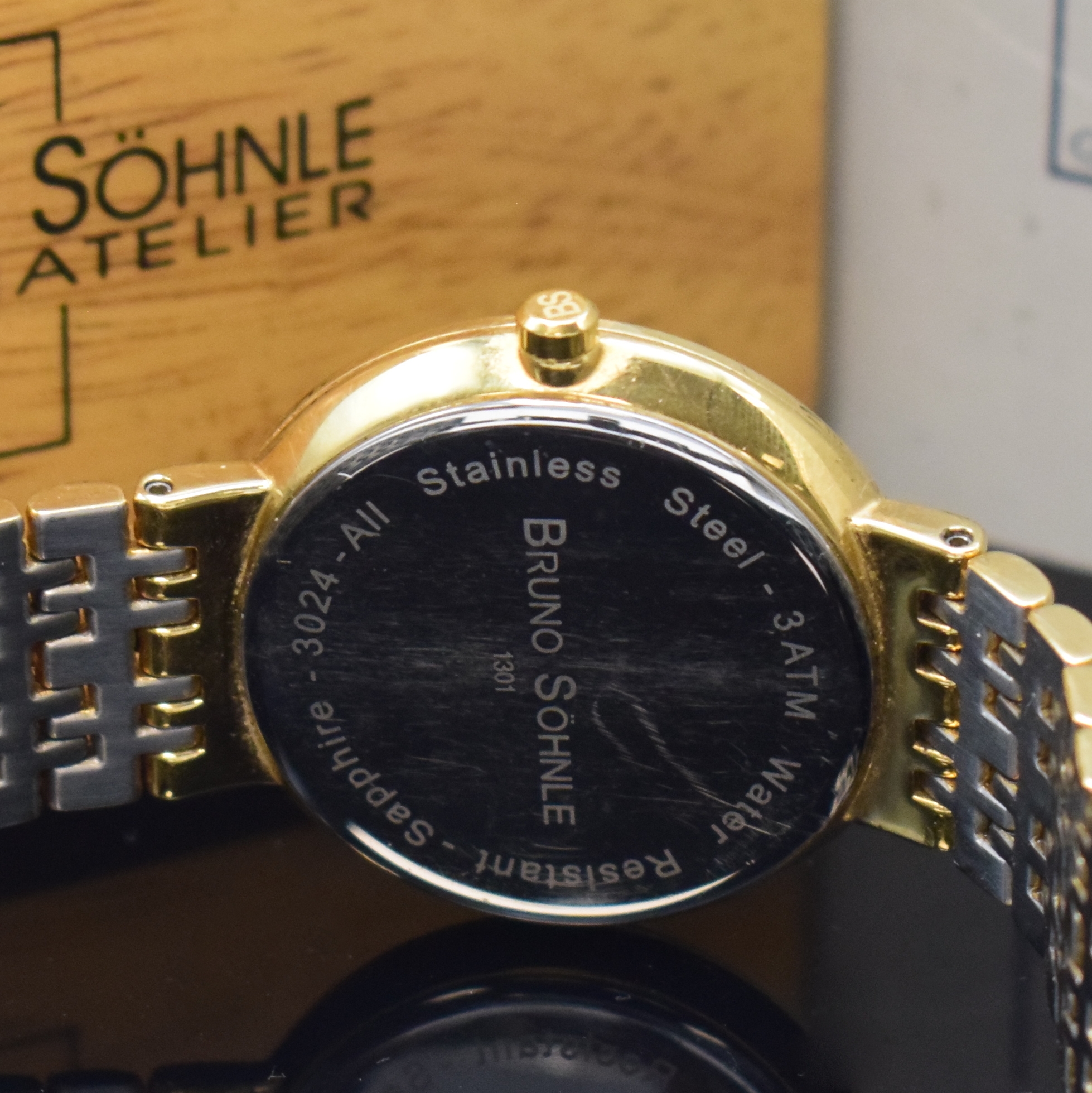 Detail d: BRUNO SÖHNLE Nabucco vergoldete Armbanduhr, Deutschland um 2005, quarz, verg. Gliederband m. dopp. Faltschl., Boden gedr., Saphirglas, cremefarb. ...