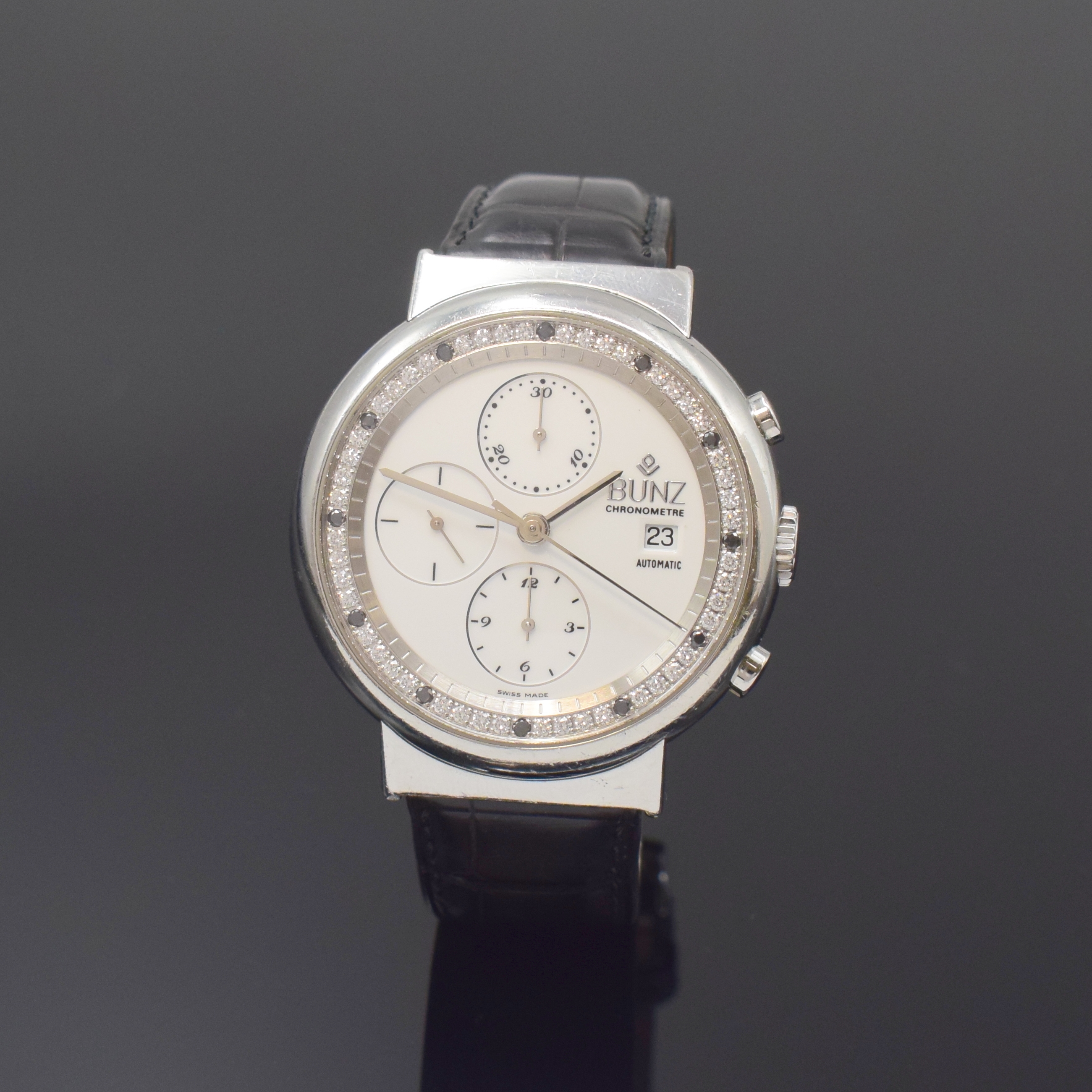 BUNZ Chronometer Herrenchronograph in Stahl mit Diamanten, Schweiz um 2015, Automatik, beids. vergl. Geh. inkl. Lederband m. orig. Dornschl., Boden ...