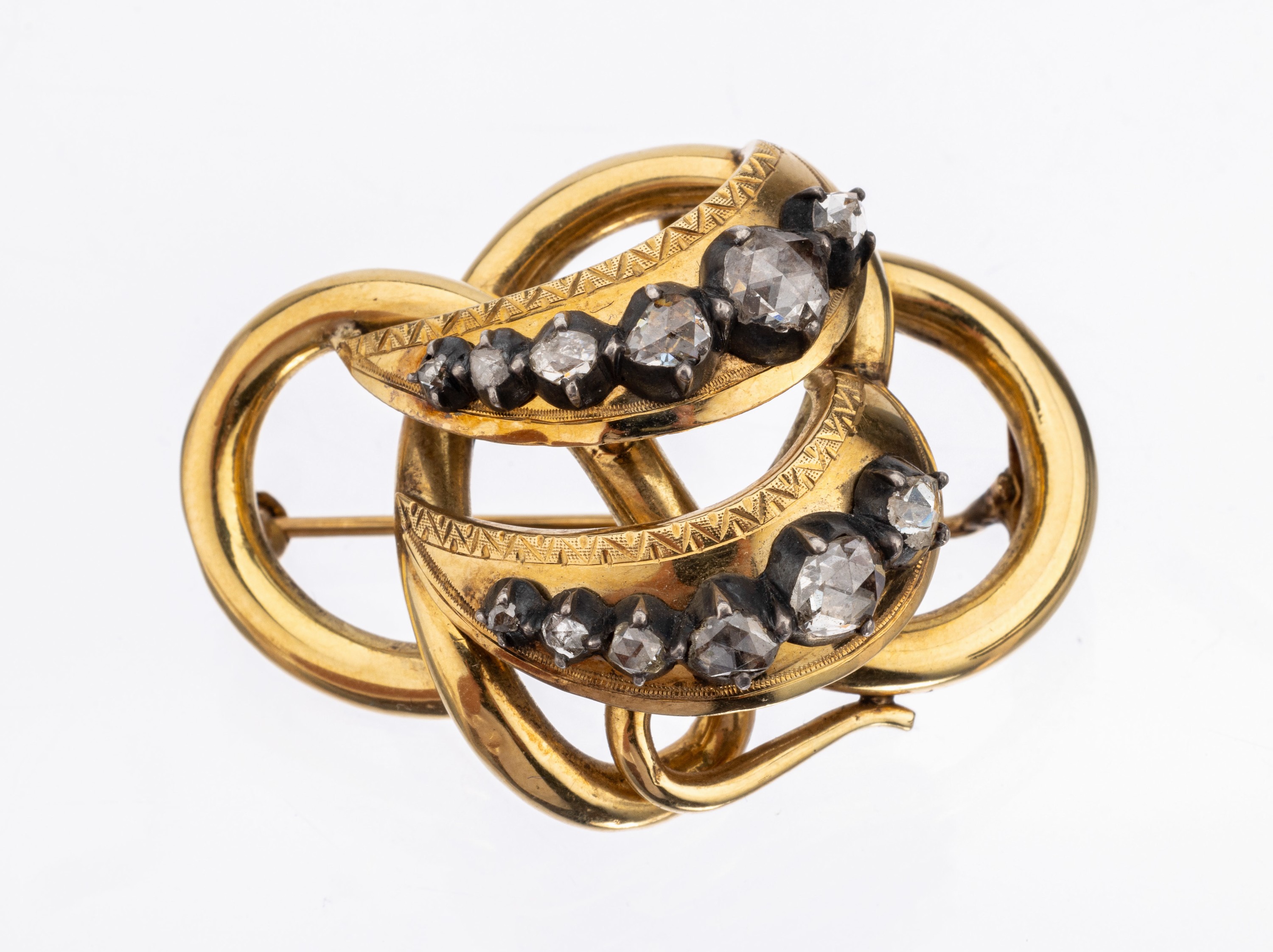 18 kt Gold Diamant-Brosche, um 1860/70, GG 585/000, 12 in Silber gefasste Diamant- Rosen, graviert, architektonischer Aufbau, ca. 4 x 3 cm, ca. 9.3 g