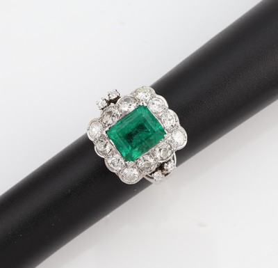 Image 18 kt gold emerald diamond ring , approx. 1920, WG 750/000, centered Colombian emerald ...