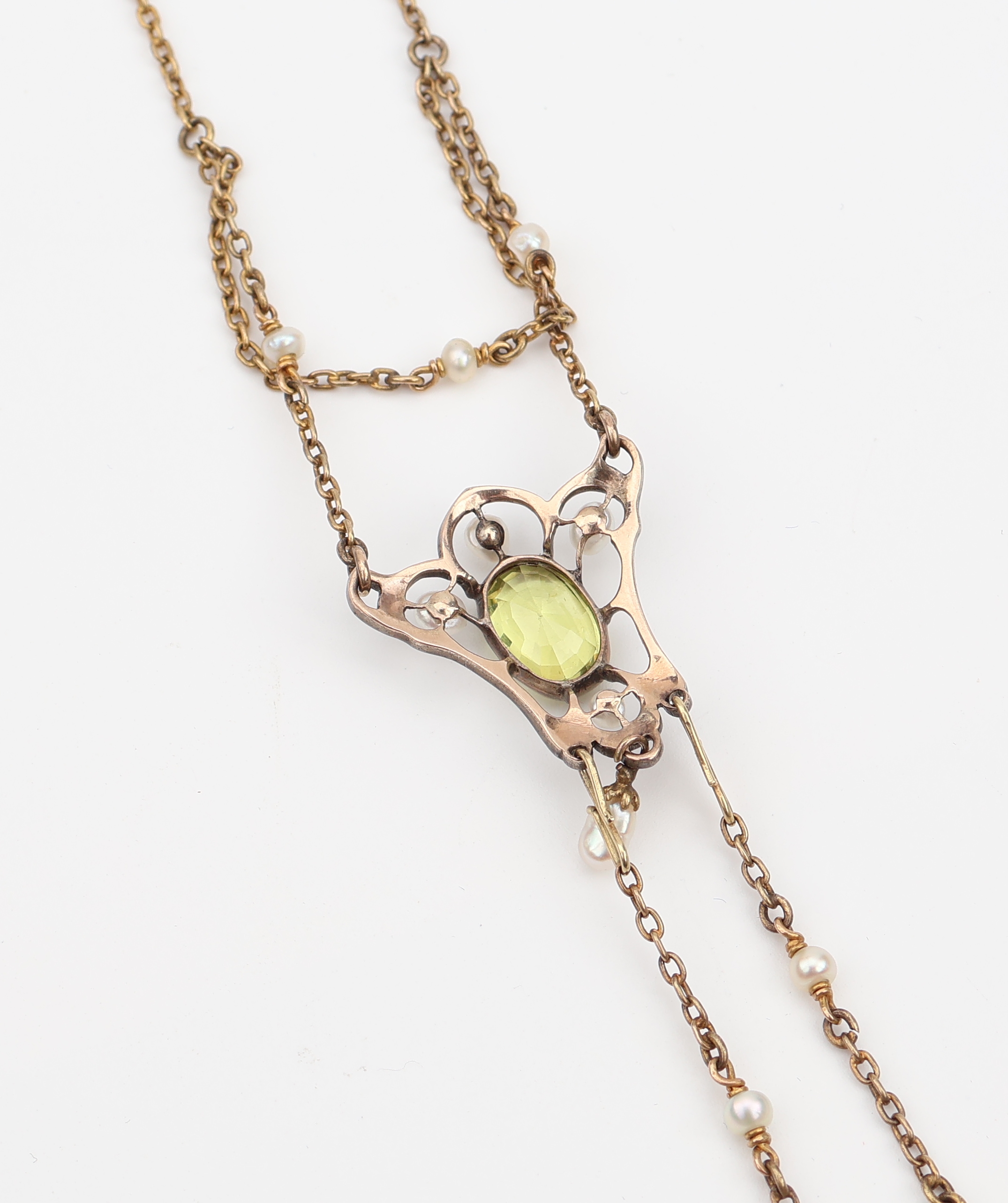 Detail c: 18 kt Gold Jugendstil Turmalin-Peridot-Perl- Collier, um 1900, GG 750/000 und Silber Mittelteil mit ovalfacett. Peridot ca. 2.50 ct, 2 facett. ...