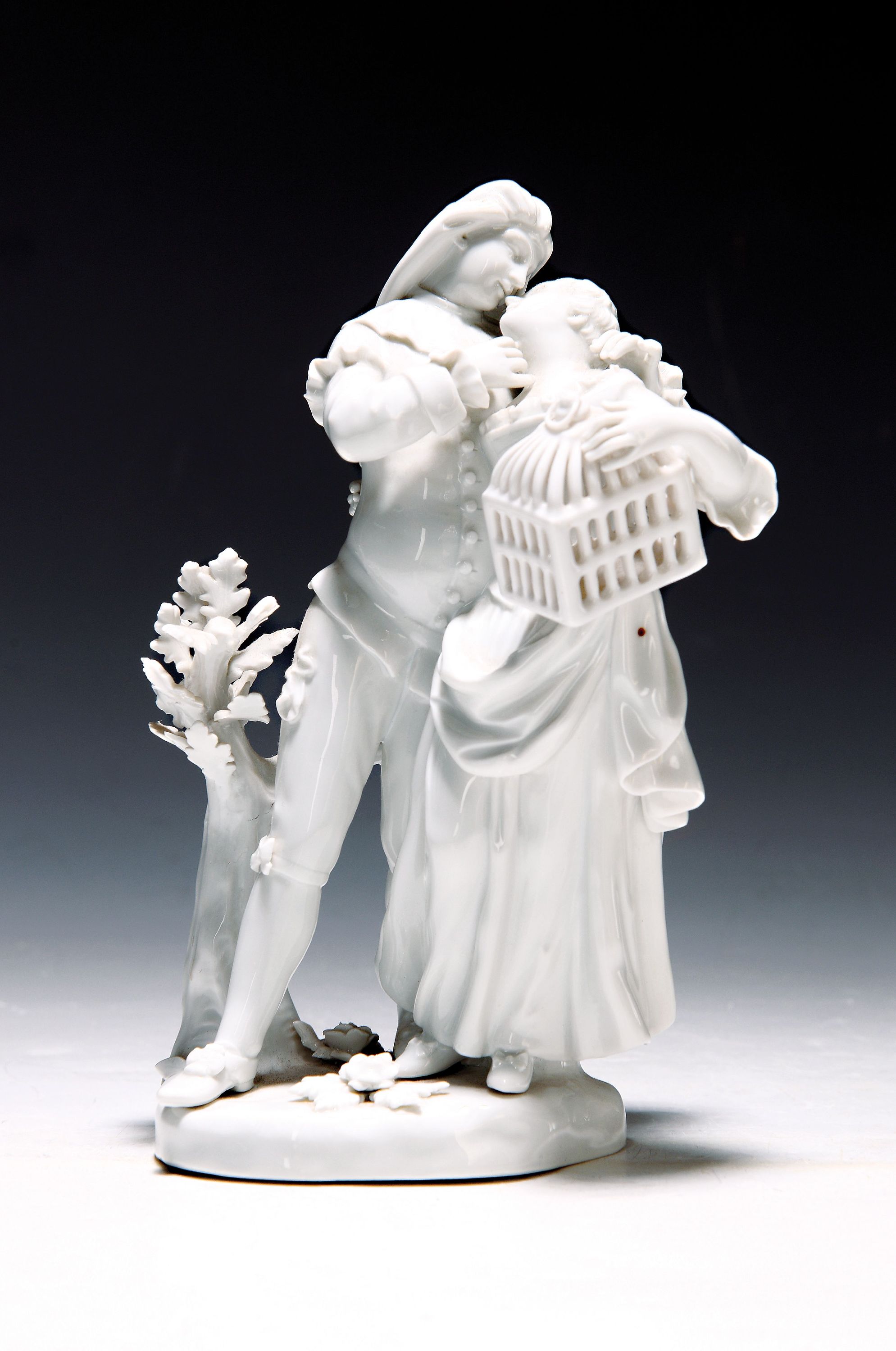 Porzellanfigurenpaar, Meissen, 20. Jh., 2. Wahl, Gärtnerpaar mit Vogelkäfig, weiß, H. ca. 18cm