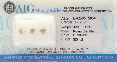 Image Lot 3 loose brilliants total approx. 0.68 ct, light Yellow/si3-p2, sealed, with AIG- ...