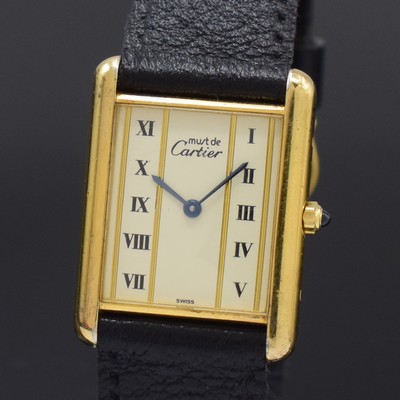 26801433a - CARTIER Tank Vermeil ladies wristwatch, quartz, gold-plated silver case, neutral leather strap with gold-plated buckle, case back screwed-down 4-times, cream colored dial with Roman numerals, blued steel hands, measures approx. 31 x 23 mm, condition 2-3