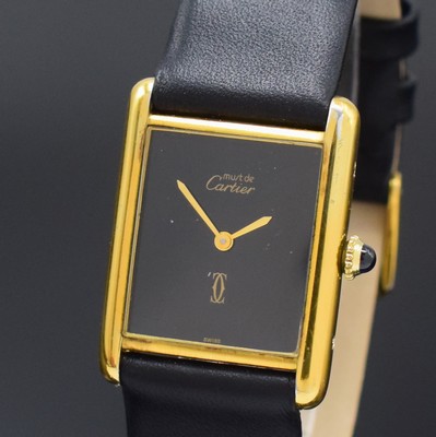 26801434a - CARTIER ladies wristwatch Tank, manual winding, gold-plated sterling silver case, case at the sides 4-times screwed down, jeweled crown, black dial with gilded hands, calibre 78-1 (base calibre ETA 2512-1), 17 jewels, measures approx. 30 x 24 mm, condition 2-3
