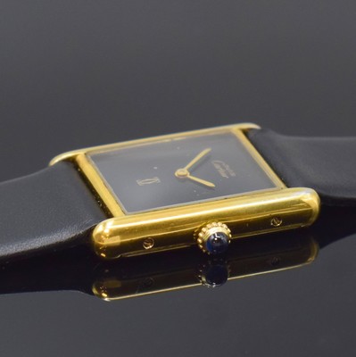 26801434b - CARTIER ladies wristwatch Tank, manual winding, gold-plated sterling silver case, case at the sides 4-times screwed down, jeweled crown, black dial with gilded hands, calibre 78-1 (base calibre ETA 2512-1), 17 jewels, measures approx. 30 x 24 mm, condition 2-3