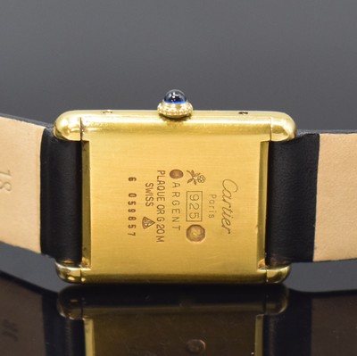 26801434c - CARTIER ladies wristwatch Tank, manual winding, gold-plated sterling silver case, case at the sides 4-times screwed down, jeweled crown, black dial with gilded hands, calibre 78-1 (base calibre ETA 2512-1), 17 jewels, measures approx. 30 x 24 mm, condition 2-3