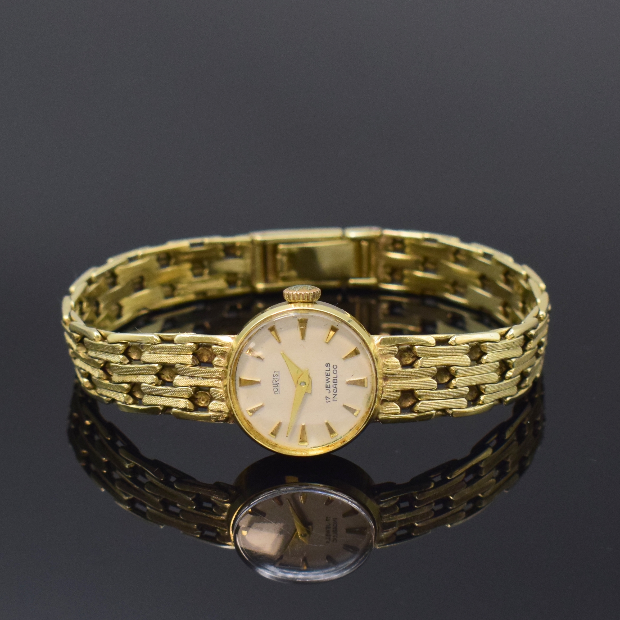 TOURIST Damenarmbanduhr in GG 585/000, Schweiz um 1965, Handaufzug, Boden aufgedr., silb. Zifferbl. m. gold. Std.-Ind. u. Zeigern,Ankerwerk Kal. AS ...