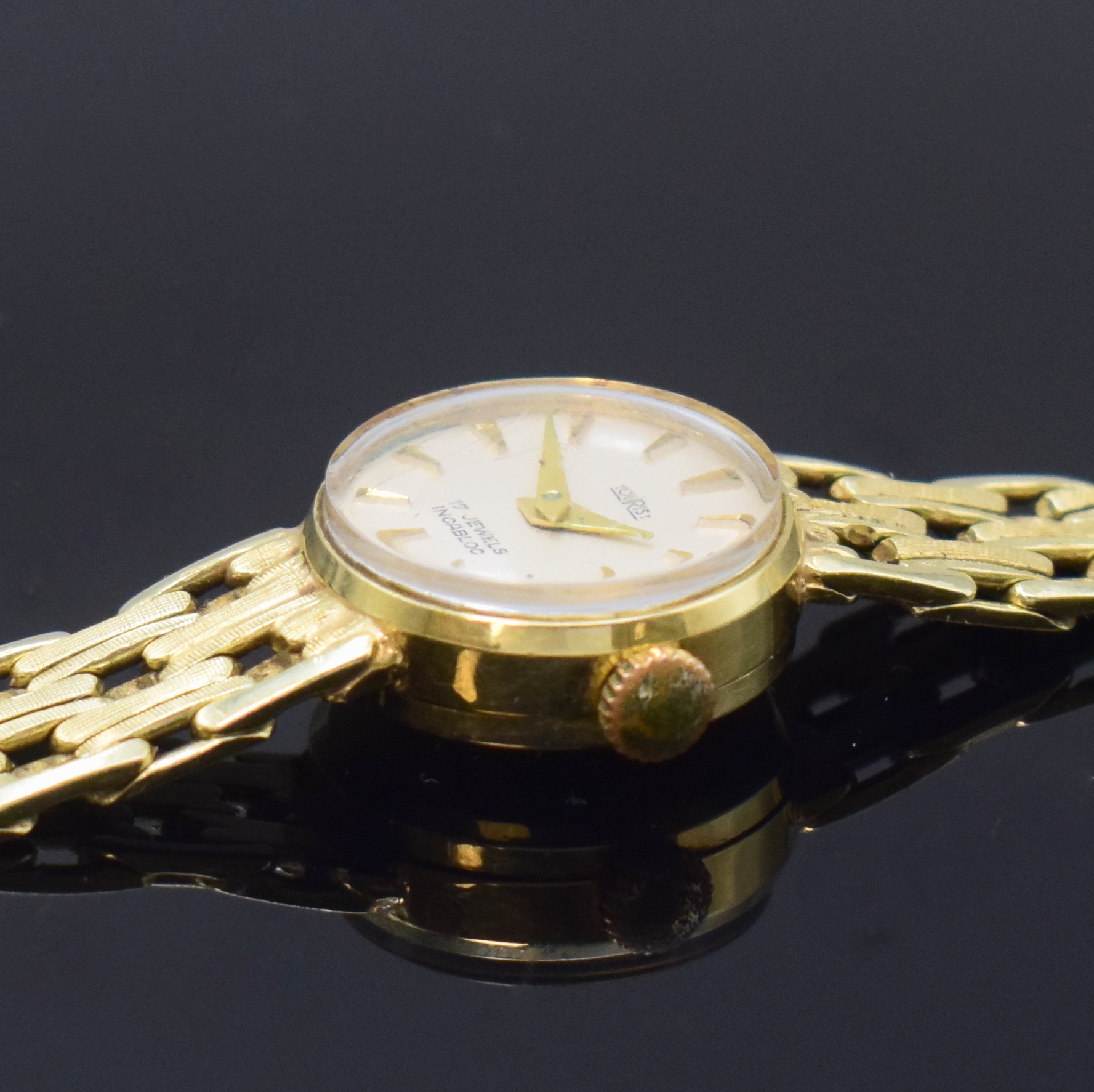 Detail c: TOURIST Damenarmbanduhr in GG 585/000, Schweiz um 1965, Handaufzug, Boden aufgedr., silb. Zifferbl. m. gold. Std.-Ind. u. Zeigern,Ankerwerk Kal. AS ...