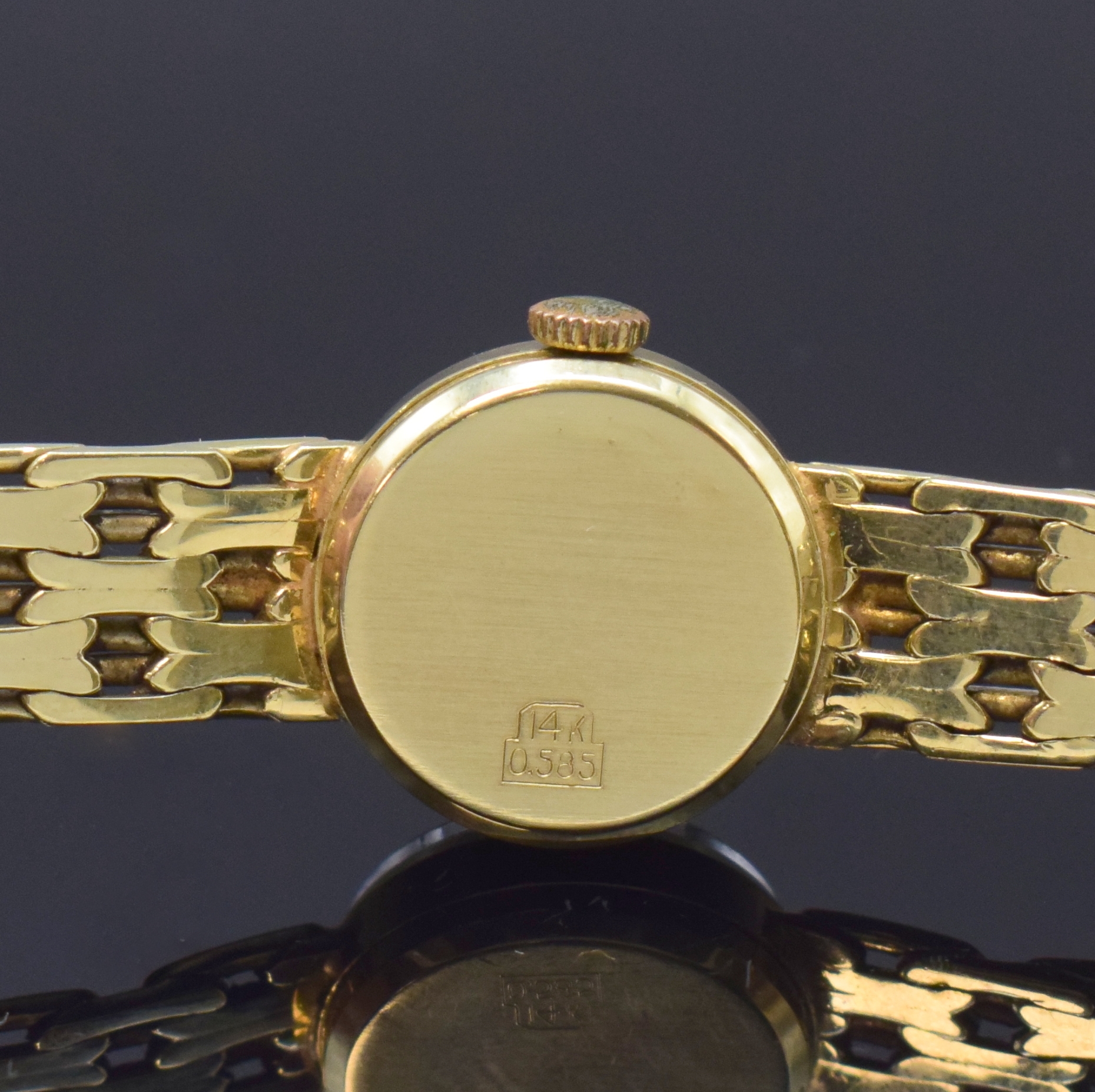 Detail d: TOURIST Damenarmbanduhr in GG 585/000, Schweiz um 1965, Handaufzug, Boden aufgedr., silb. Zifferbl. m. gold. Std.-Ind. u. Zeigern,Ankerwerk Kal. AS ...