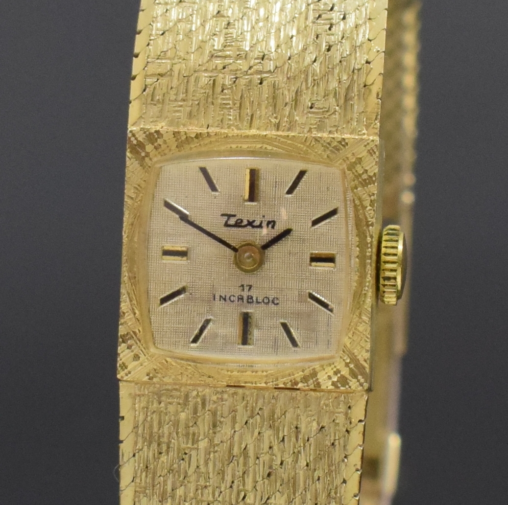 Detail a: TEXIN Damenarmbanduhr in GG 585/000, Schweiz um 1970, Handaufzug, Geh. an Goldband, Boden aufgedr., vers. strukt. Zifferbl. m. aufges. Std.-Ind., ...