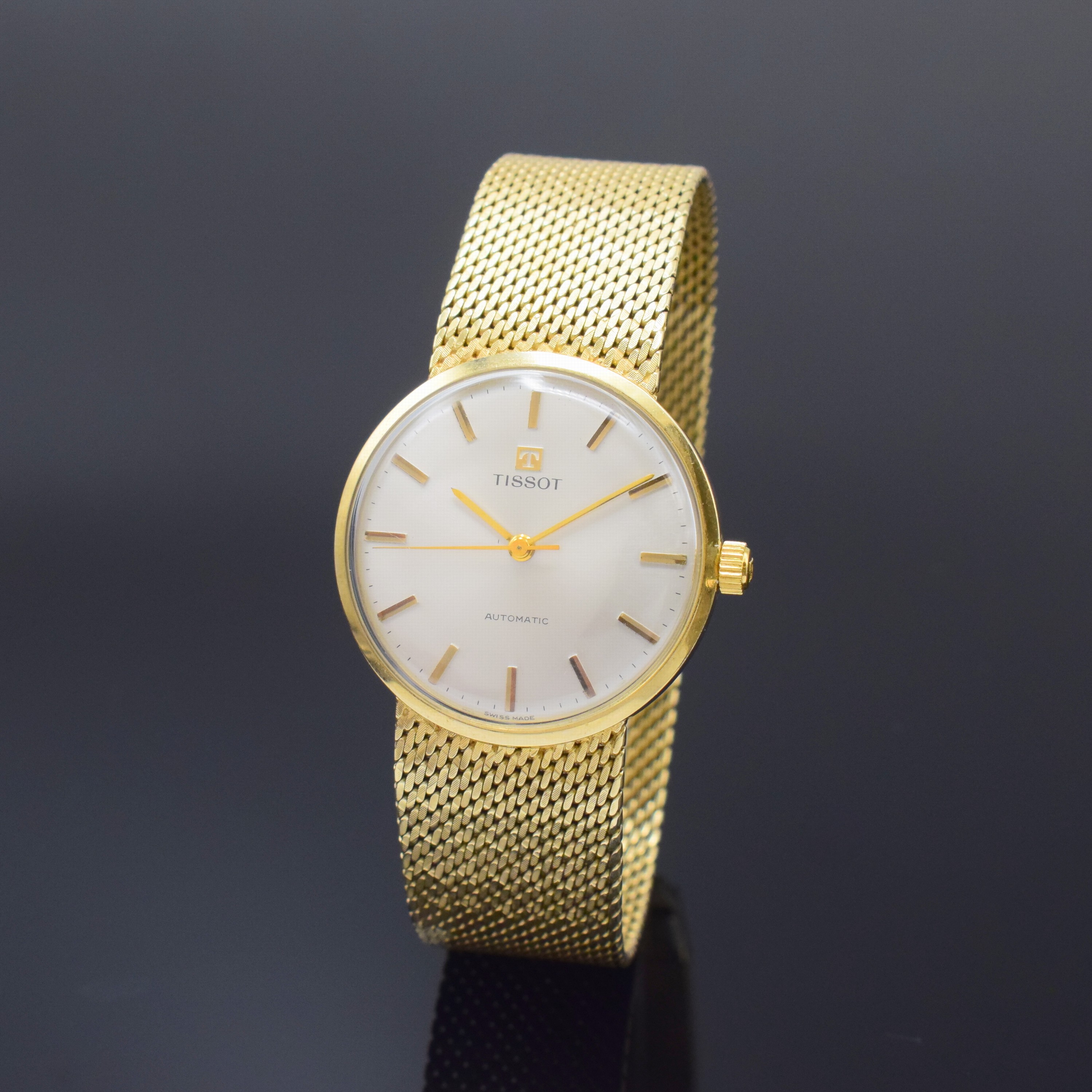TISSOT Herrenarmbanduhr in GG 585/000, Schweiz um 1965, Automatik, Boden aufgedr., vers. Zifferbl. m. gold. Std.-Ind., gold. Zeiger, Kal. 783, 21 ...