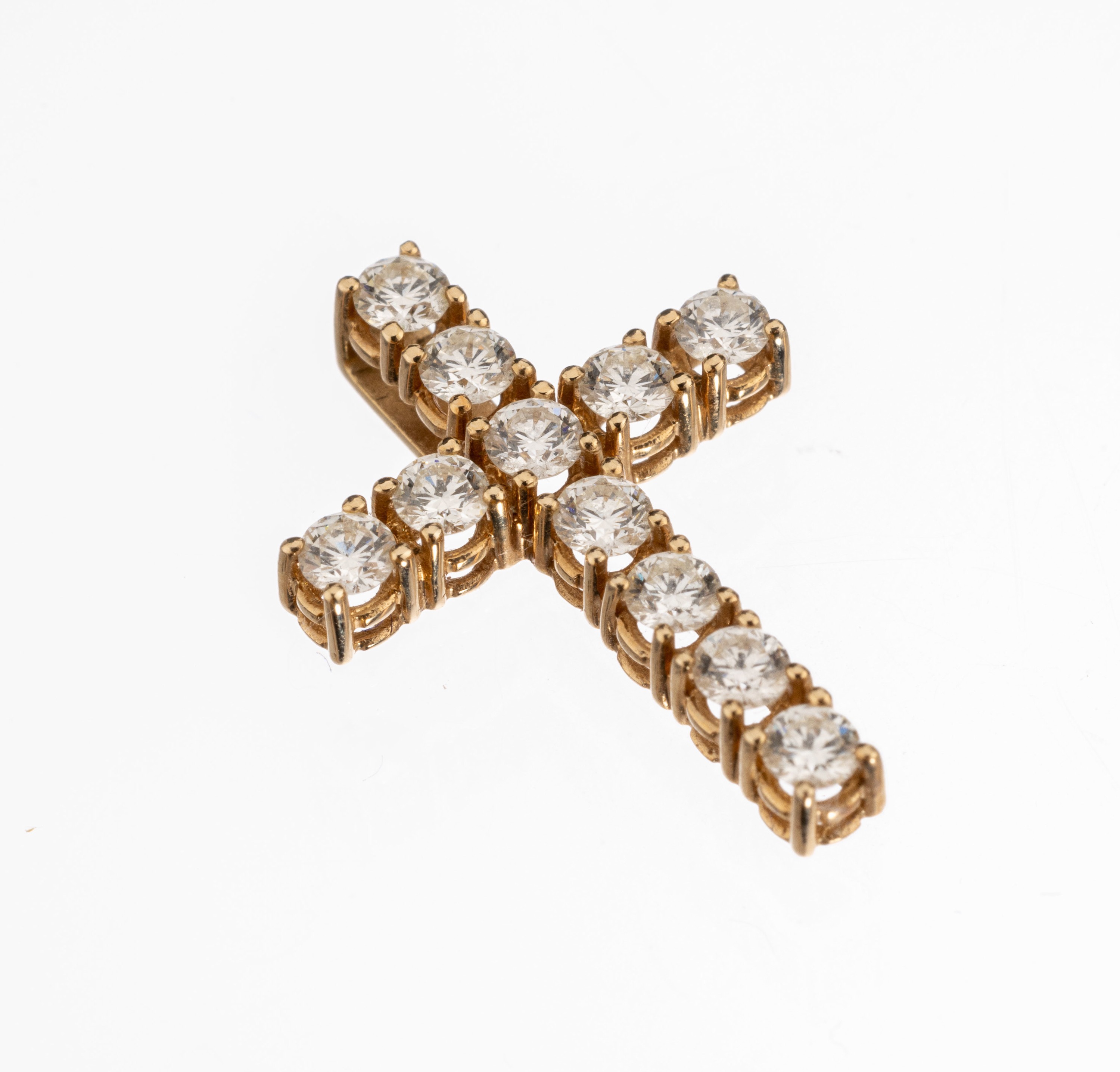 14 kt Gold Brillant-Kreuzanhänger, GG 585/000, 11 Brillanten zus. ca. 0.55 ct feines Weiss -Weiss/vs, total ca. 1.2 g, L. ca. 2 cm