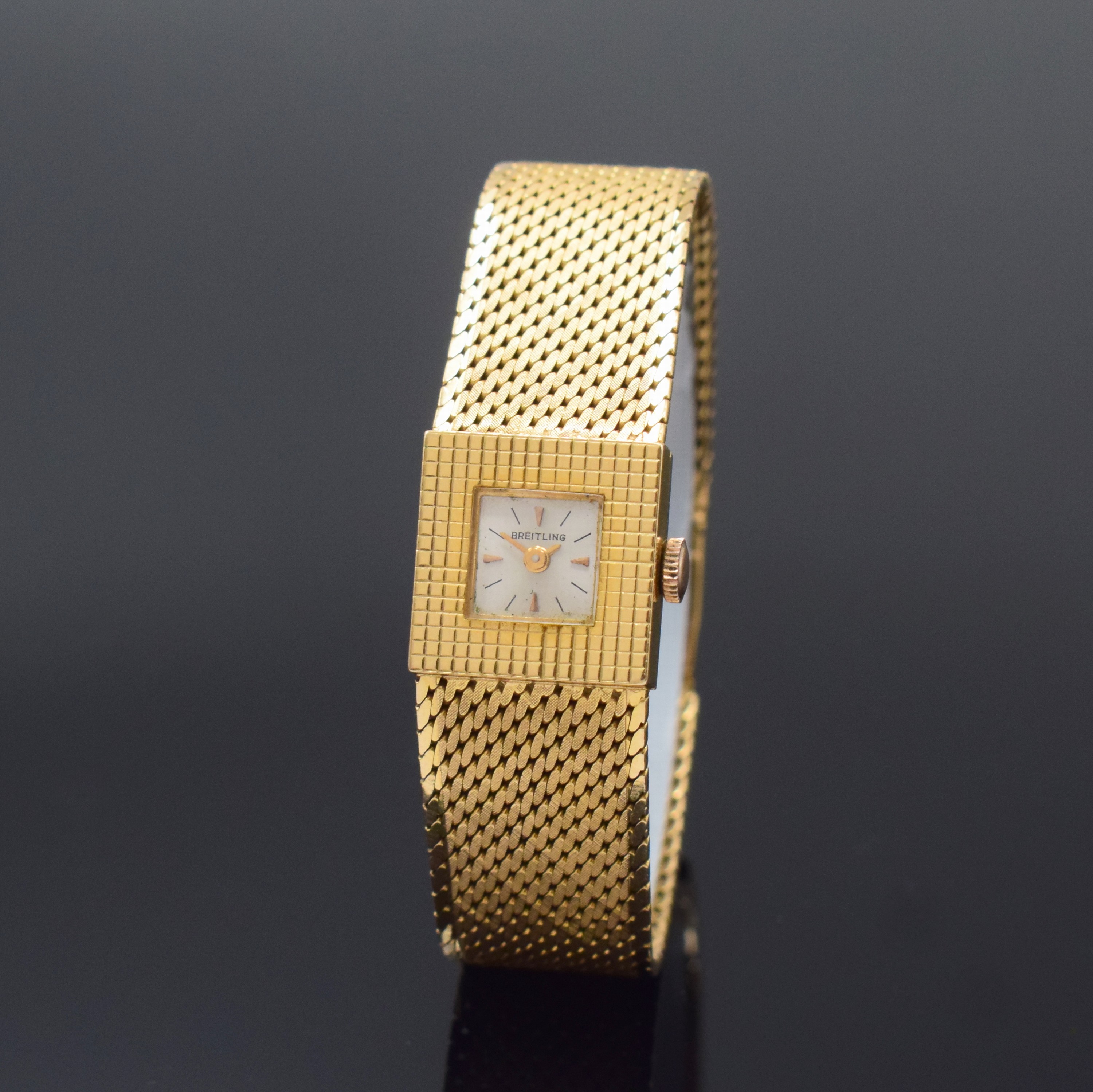 BREITLING Damenarmbanduhr in RG 750/000, Schweiz um 1964, Handaufzug, Boden aufgedr., silb. Zifferbl. m. gold. Zeigern, sign. Ankerwerk m. 17 St., M. ...