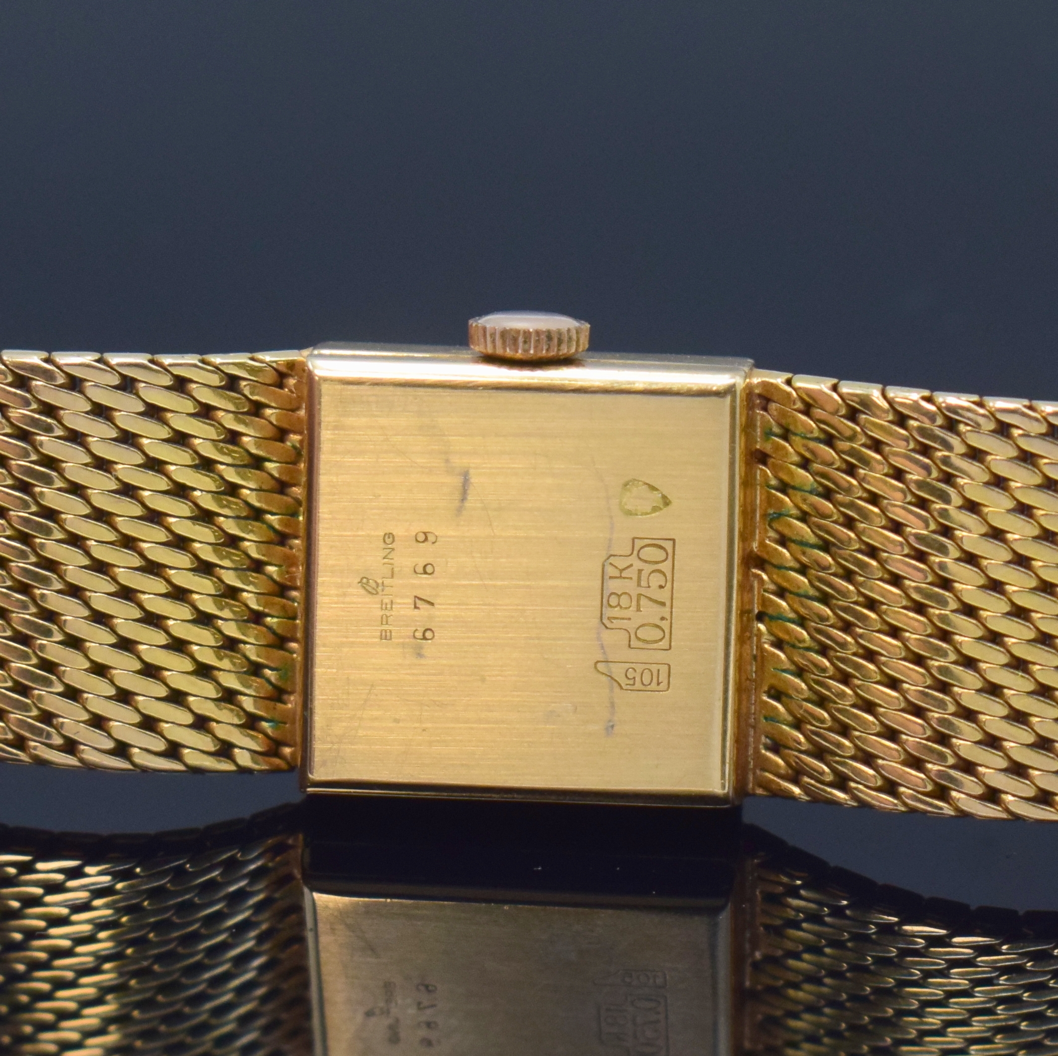 Detail c: BREITLING Damenarmbanduhr in RG 750/000, Schweiz um 1964, Handaufzug, Boden aufgedr., silb. Zifferbl. m. gold. Zeigern, sign. Ankerwerk m. 17 St., M. ...