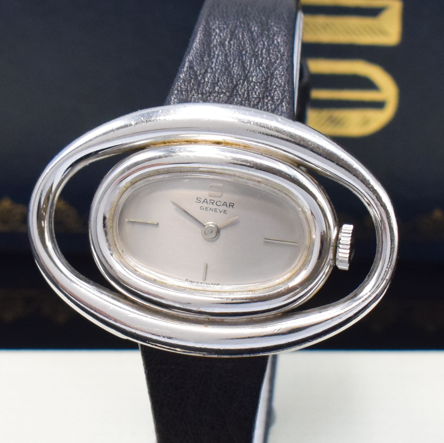 Detail a: SARCAR ausgefallene Damenarmbanduhr in Stahl, Schweiz verk. lt. beil. Garantie 08/1975, Handaufzug, orig. Lederband m. Dornschl., Boden aufgedr., ...