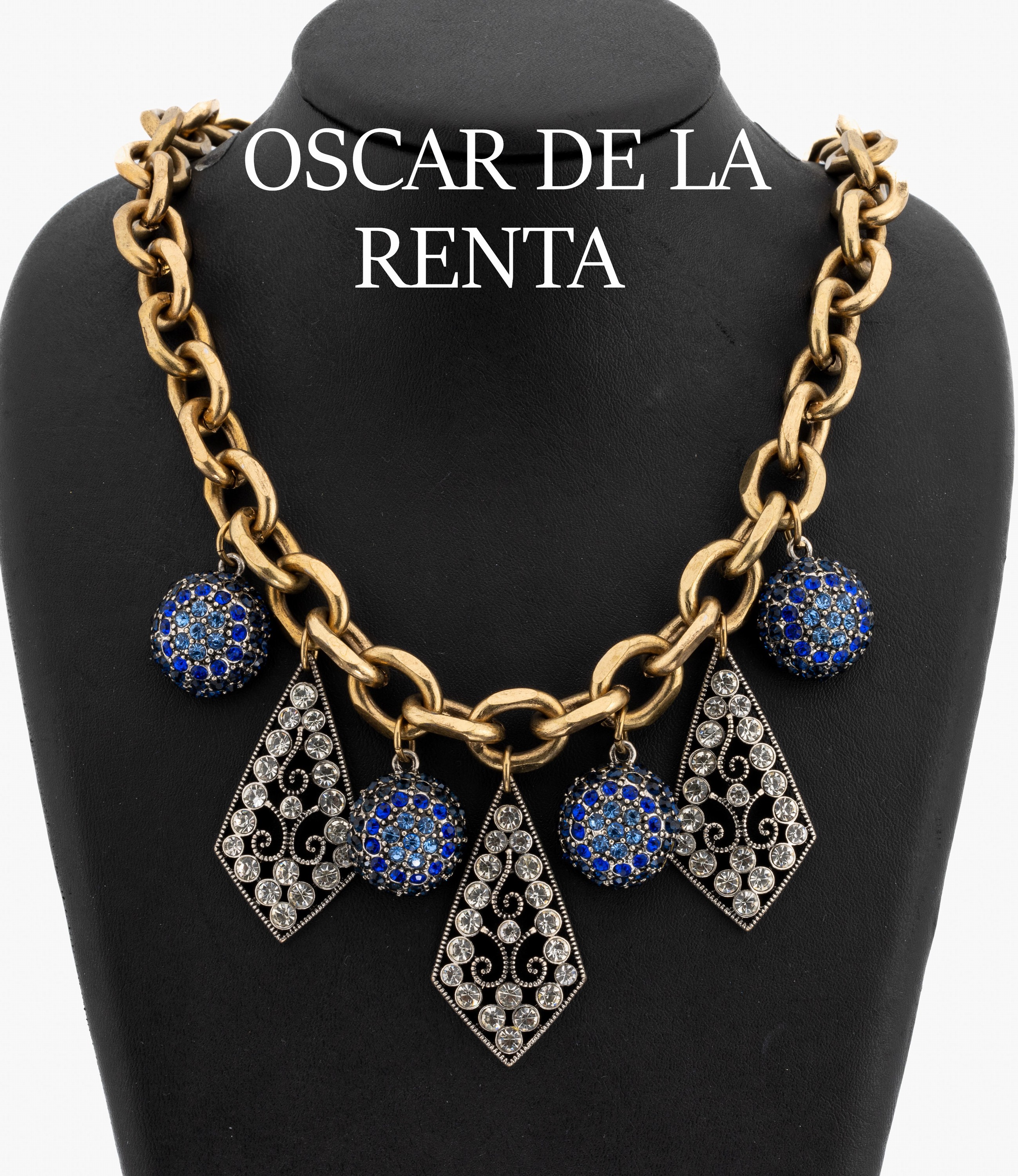 OSCAR DE LA RENTA Collier, USA um 1980, Metall verg. und vers., massive Ausführung, bewegl. Abhängungen mit blauen und farblosen Strasssteinen, L. ...