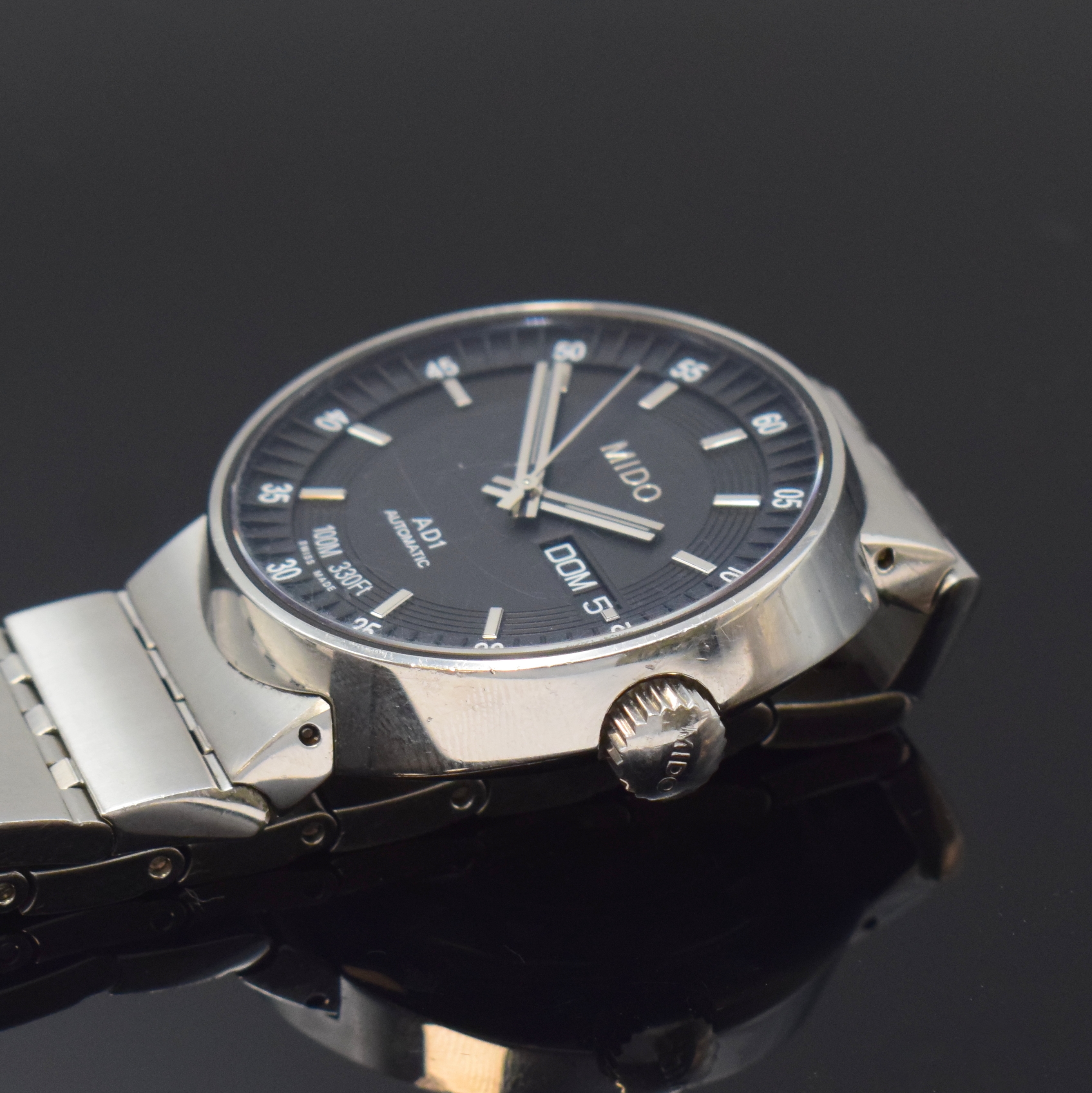 Detail c: MIDO AD1 Herrenarmbanduhr in Stahl Referenz M8330, Schweiz um 2010, Automatik, beids. verg. Geh. inkl. orig. Gliederband m. Faltschl., Boden u. Krone ...