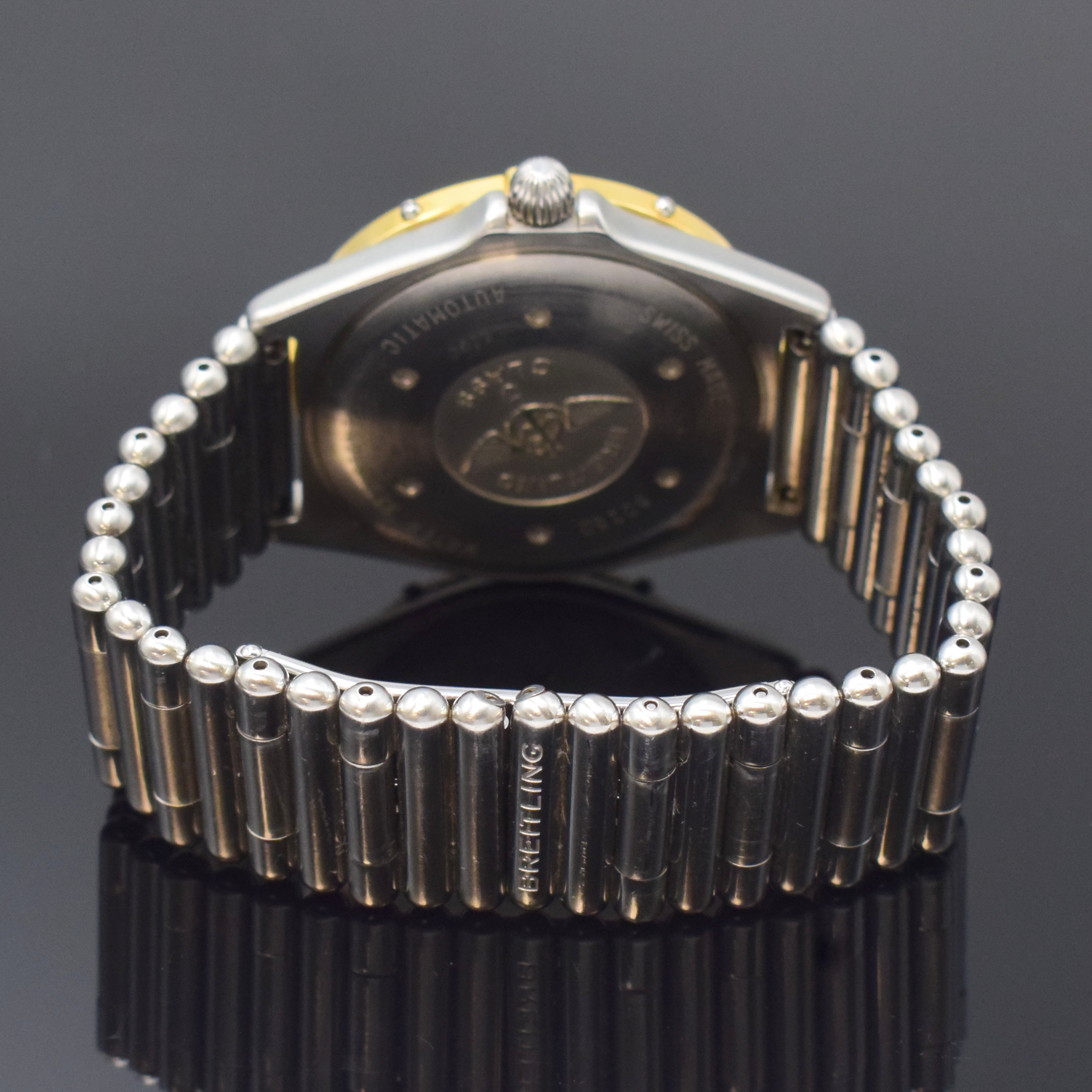 Detail b: BREITLING J-Class Herrenarmbanduhr Referenz 80250, Schweiz um 1995, Automatik, verschr. Edelstahlgeh. inkl. orig. Roleauxband m. dopp. Faltschl., ...