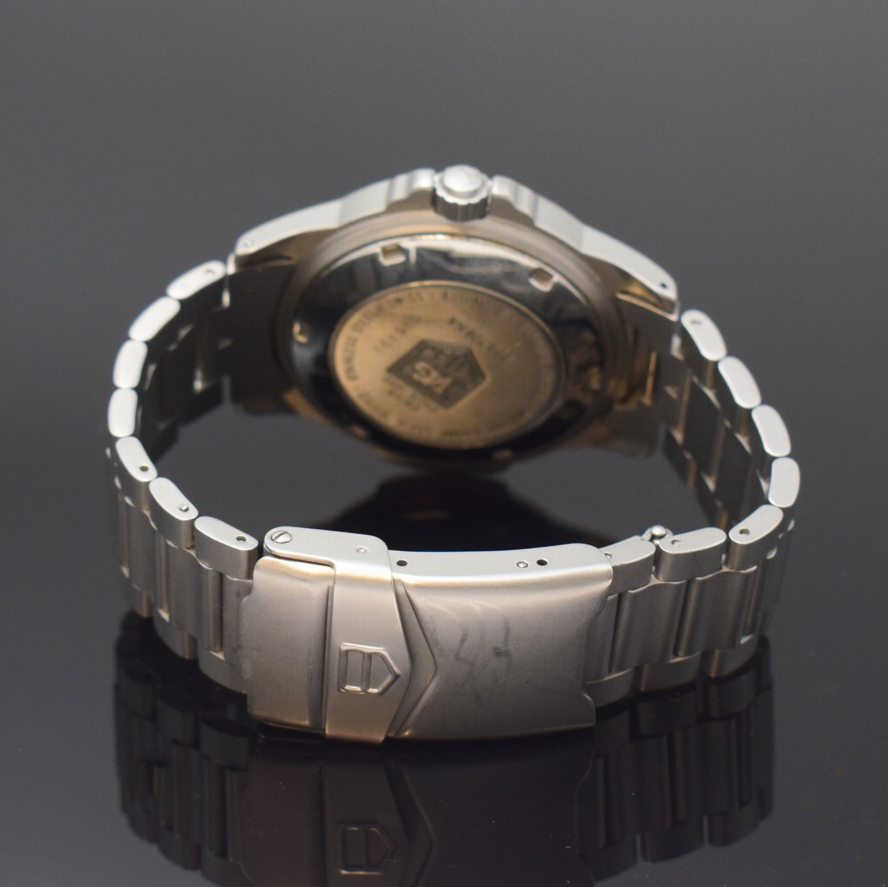 Detail b: TAG HEUER 4000 Herrenarmbanduhr in Stahl Referenz 699.706, Schweiz um 2000, Automatik, orig. Gliederband m. Faltschl., Tauchverlängerung, Boden ...