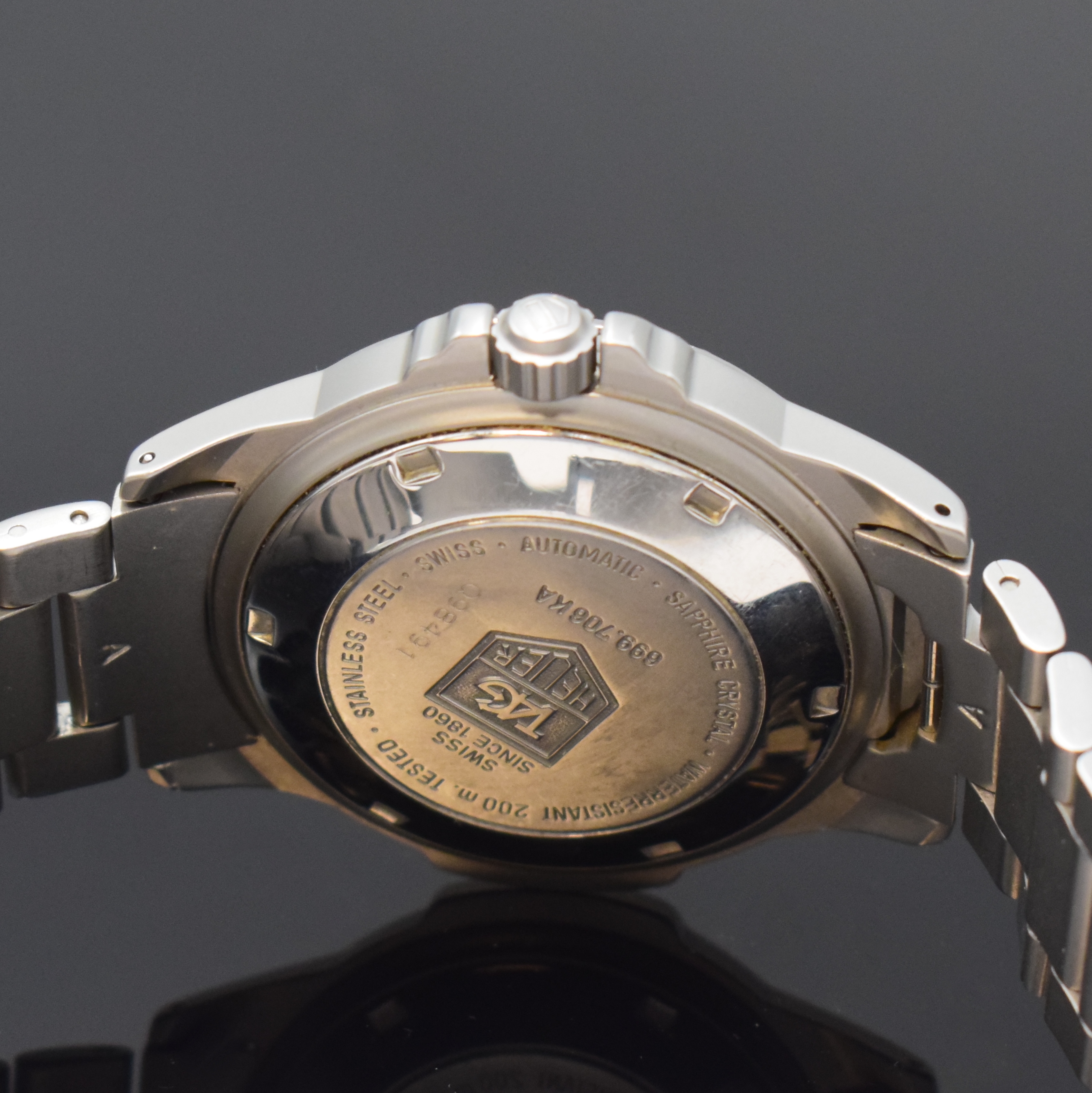 Detail d: TAG HEUER 4000 Herrenarmbanduhr in Stahl Referenz 699.706, Schweiz um 2000, Automatik, orig. Gliederband m. Faltschl., Tauchverlängerung, Boden ...