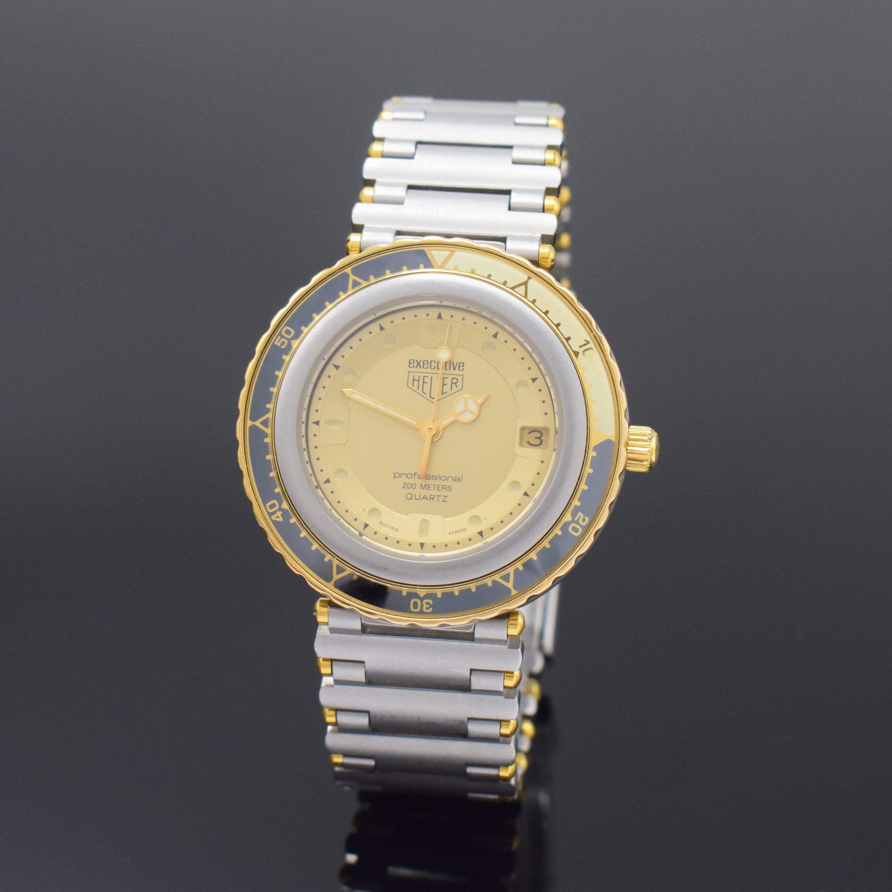 HEUER professional Executive Armbanduhr Referenz 915.413, Schweiz um 1985, quarz, Edelstahlgeh. inkl. orig. Gliederband m. Faltschl., Boden u. Krone ...
