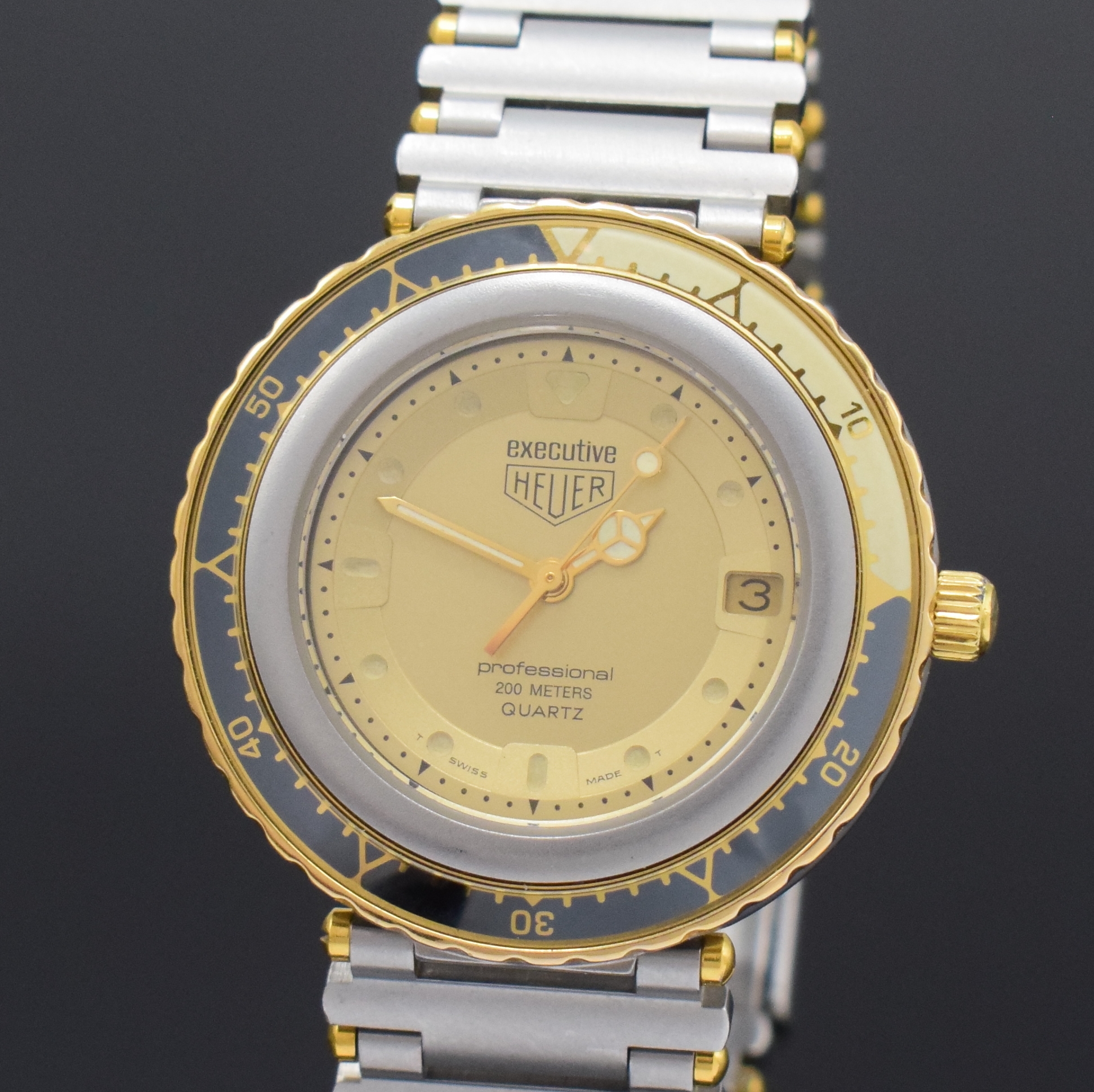 Detail a: HEUER professional Executive Armbanduhr Referenz 915.413, Schweiz um 1985, quarz, Edelstahlgeh. inkl. orig. Gliederband m. Faltschl., Boden u. Krone ...