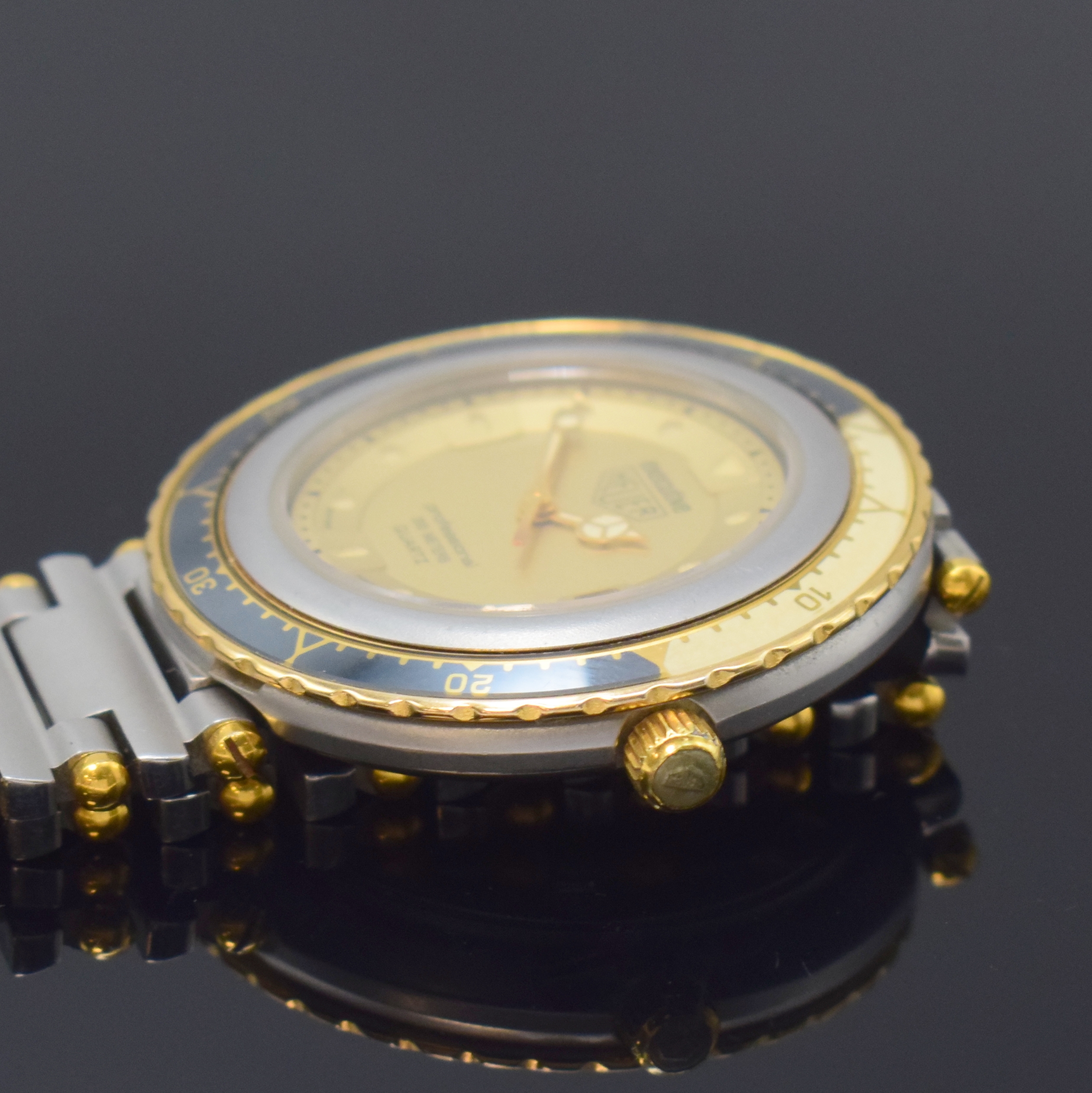 Detail c: HEUER professional Executive Armbanduhr Referenz 915.413, Schweiz um 1985, quarz, Edelstahlgeh. inkl. orig. Gliederband m. Faltschl., Boden u. Krone ...
