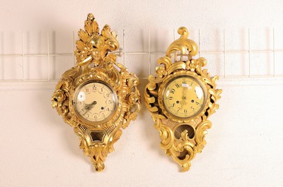 Image Two cartel clocks, Sweden around 1900/1930, carved and painted with gold, in the rococo ...