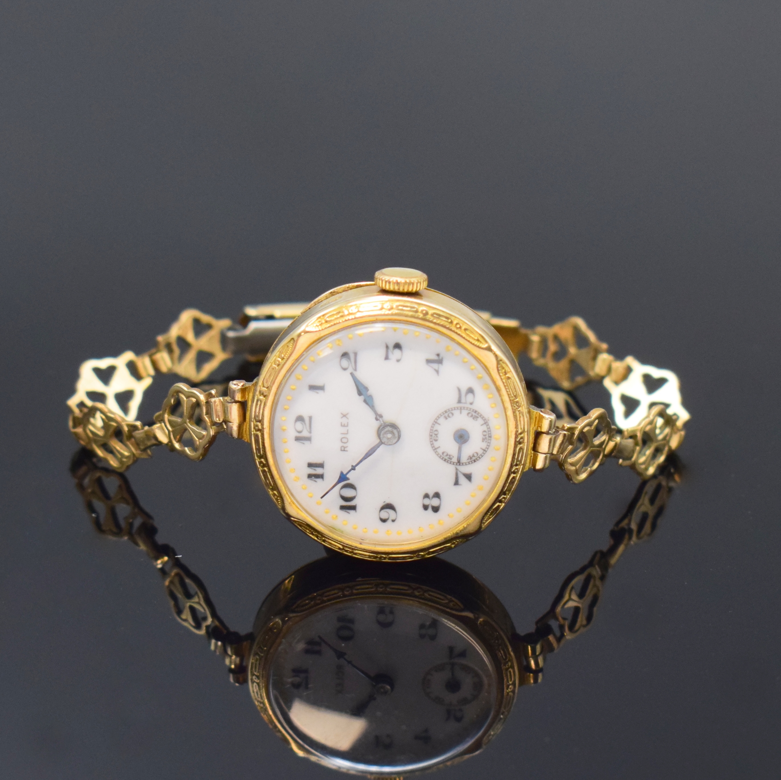 ROLEX frühe Armbanduhr in GG 375/000, Schweiz fürden engl. Markt um 1915, Handaufzug, Geh. dell., Scharnierboden, verg. passendes Band, ...