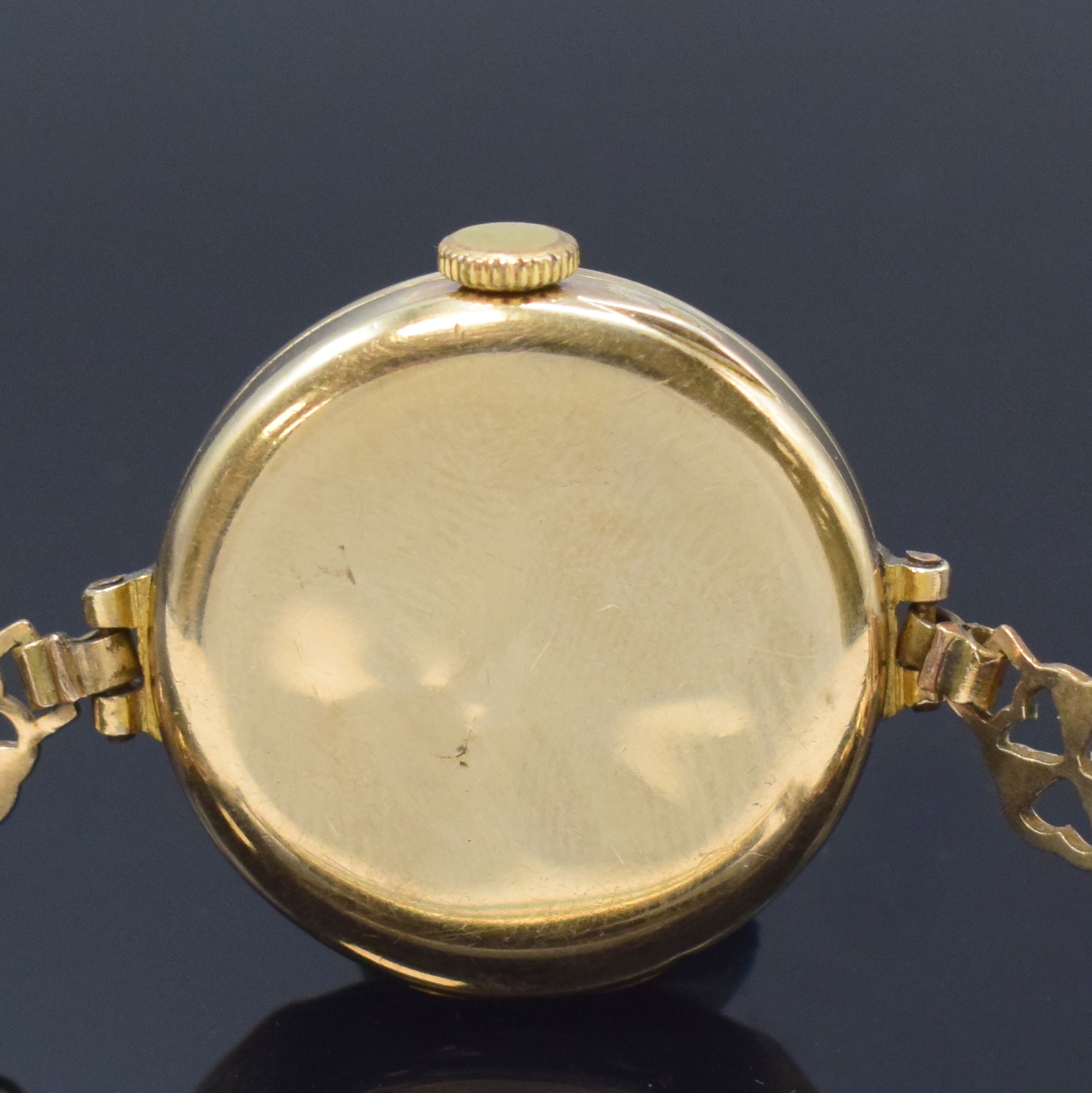 Detail d: ROLEX frühe Armbanduhr in GG 375/000, Schweiz fürden engl. Markt um 1915, Handaufzug, Geh. dell., Scharnierboden, verg. passendes Band, ...