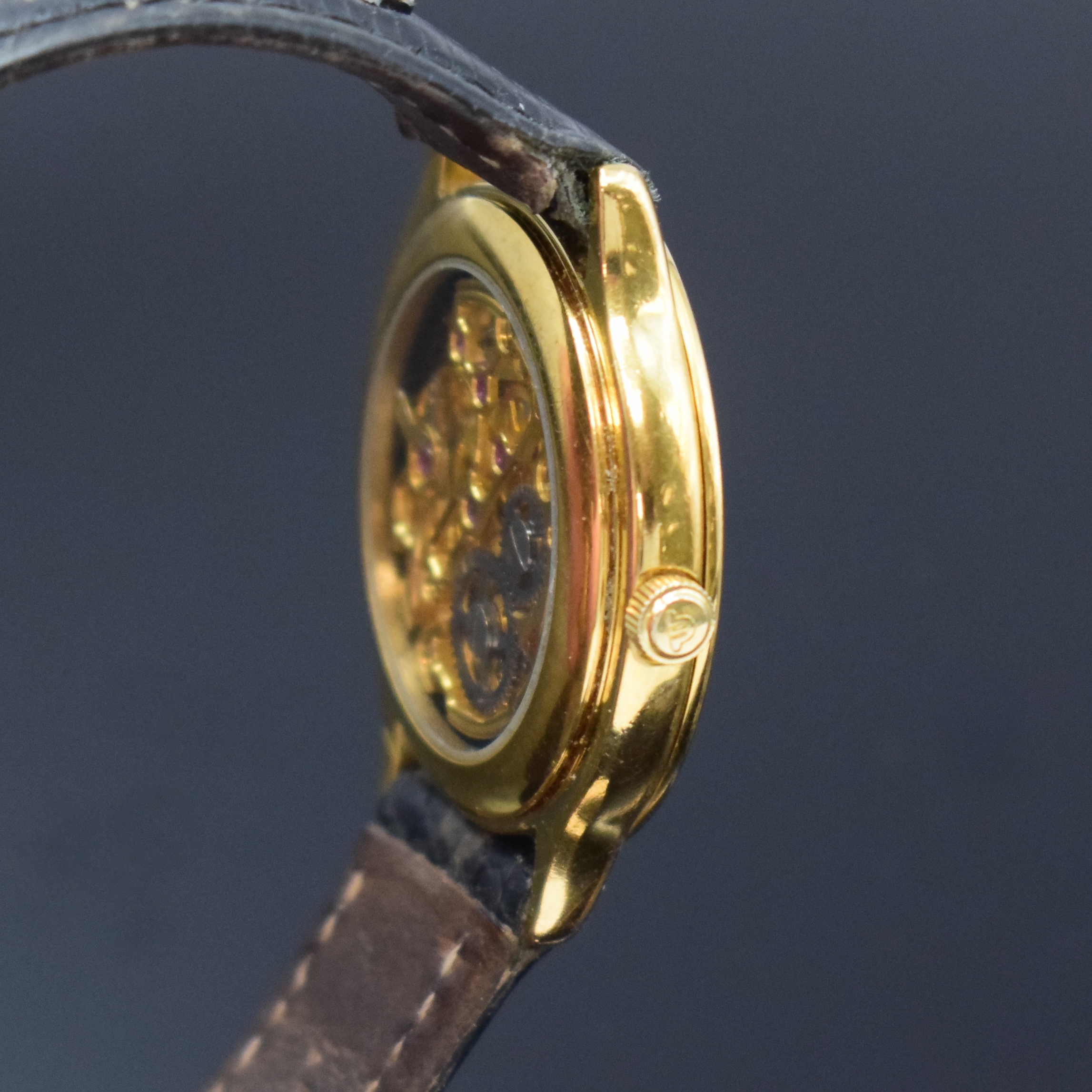 Detail c: MAURICE LACROIX Skelettierte Armbanduhr, Schweiz um 1990, Handaufzug, verg. Geh. beids. vergl., Boden aufgedr., Lederband m. verg. dopp. Faltschl., ...