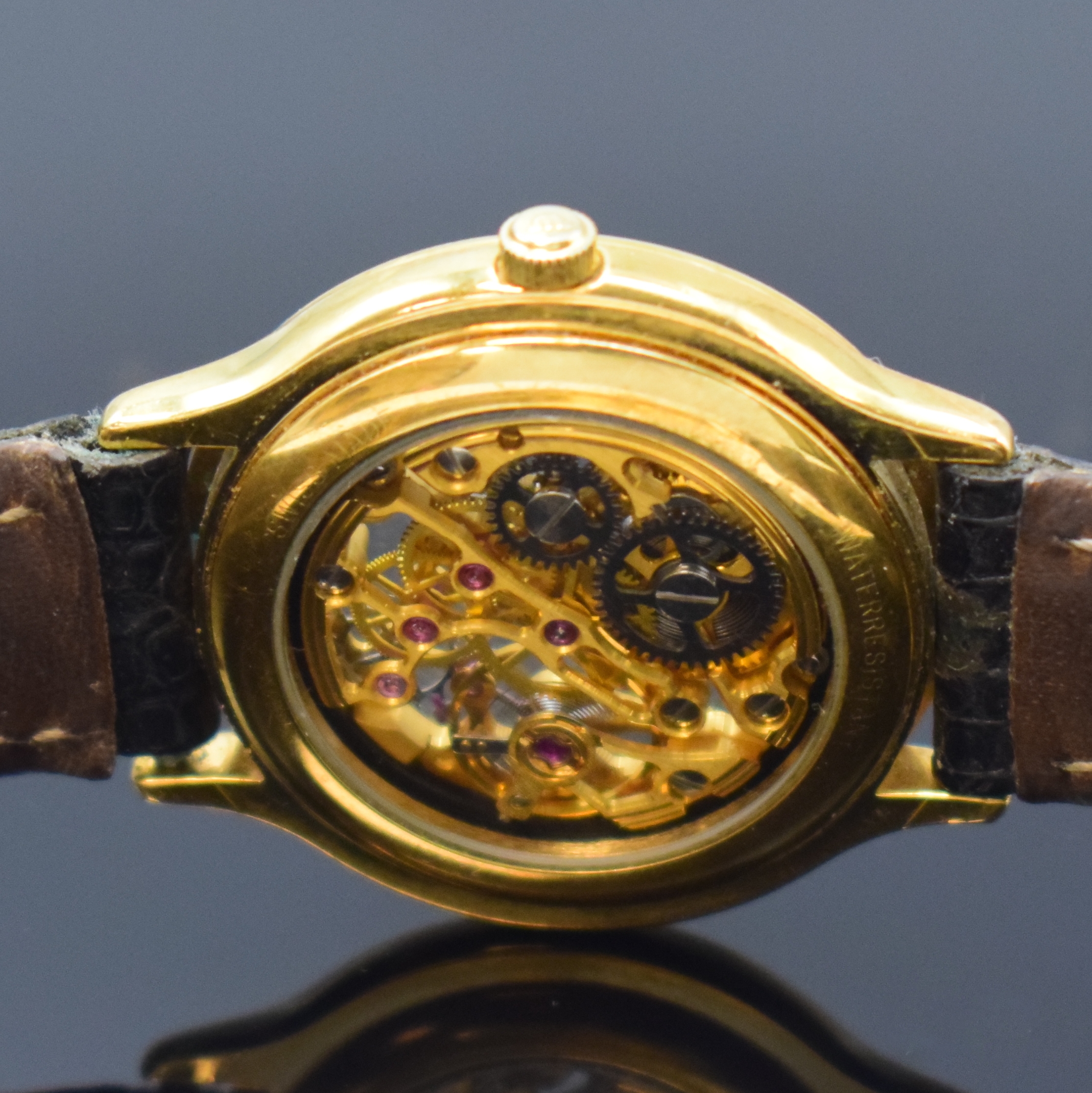 Detail d: MAURICE LACROIX Skelettierte Armbanduhr, Schweiz um 1990, Handaufzug, verg. Geh. beids. vergl., Boden aufgedr., Lederband m. verg. dopp. Faltschl., ...