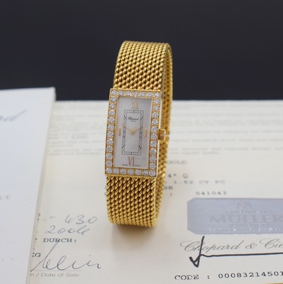 Image CHOPARD ladies wristwatch in 18k yellow gold with diamonds, quartz, reference 488 1, case with integrated gold bracelet with butterfly buckle, case back screwed-down 4-times, bezel lavish with diamonds (1.52 ct.), mother of pearl-dial with gilded hands, 4 Roman numerals, measures approx. 30 x 18 mm, length approx. 17,5 cm, certificate enclosed, condition 2