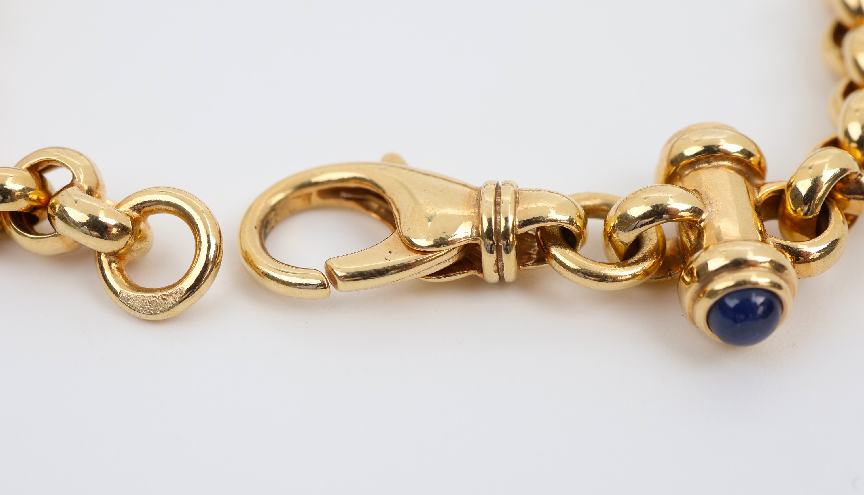 Detail c: 14 kt Gold Saphir-Armband, GG 585/000, Erbskette, Zierelement mit 2 kl. Saphircabochons, L. ca. 18.5 cm, ca. 14.2 g