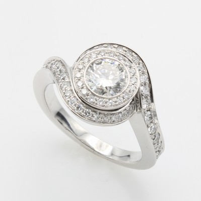 Image Ring mit Brillanten, WG 750/000, Mittelstein ca. 0.70 ct und 54 Brill. zus. ca. 0.59 ct ...