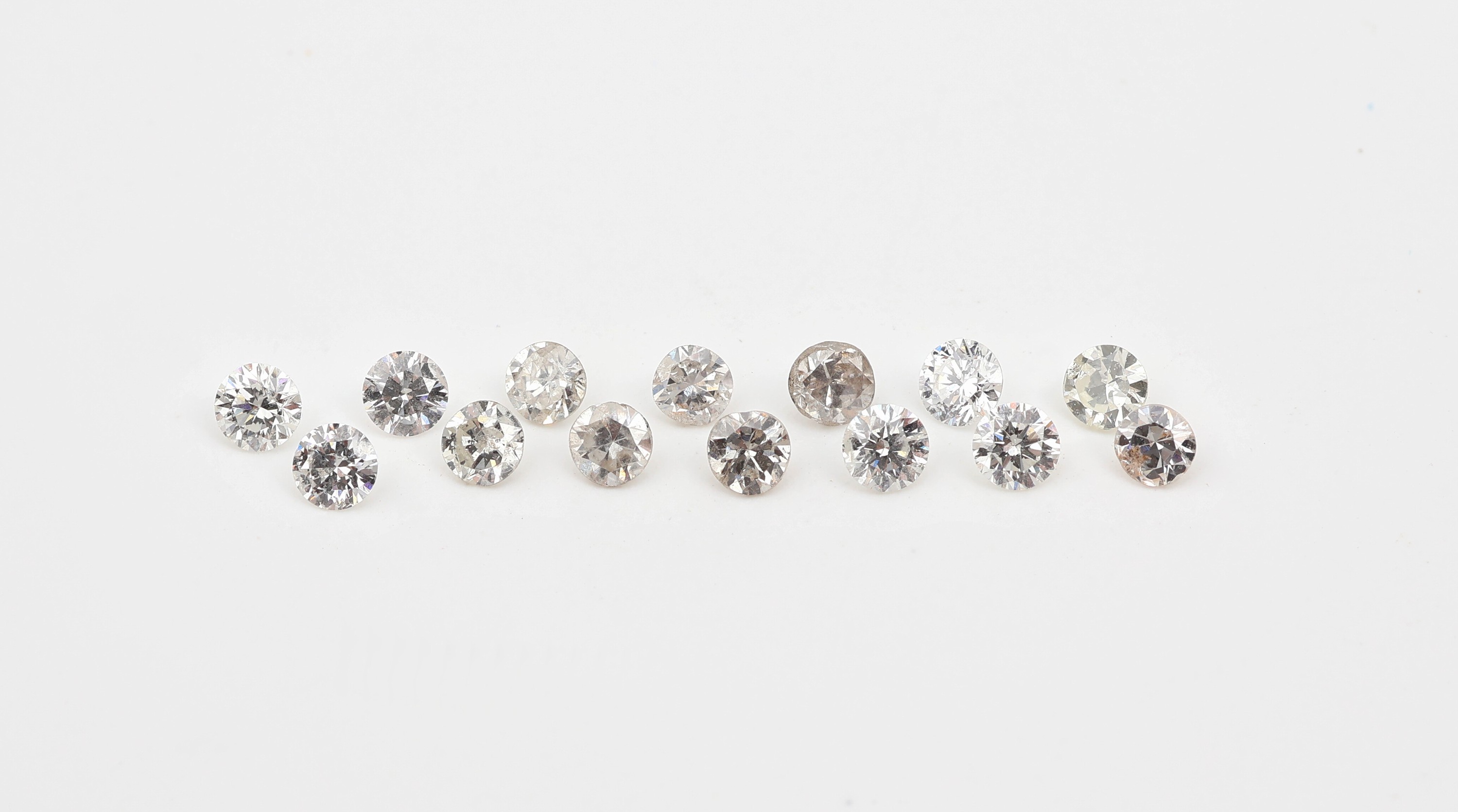 Lot 14 lose Brillanten, zus. ca. 1.08 ct, Weiss-get.Weiss/si-p1, kalibriert ca. 2.5 - 2.7 mm