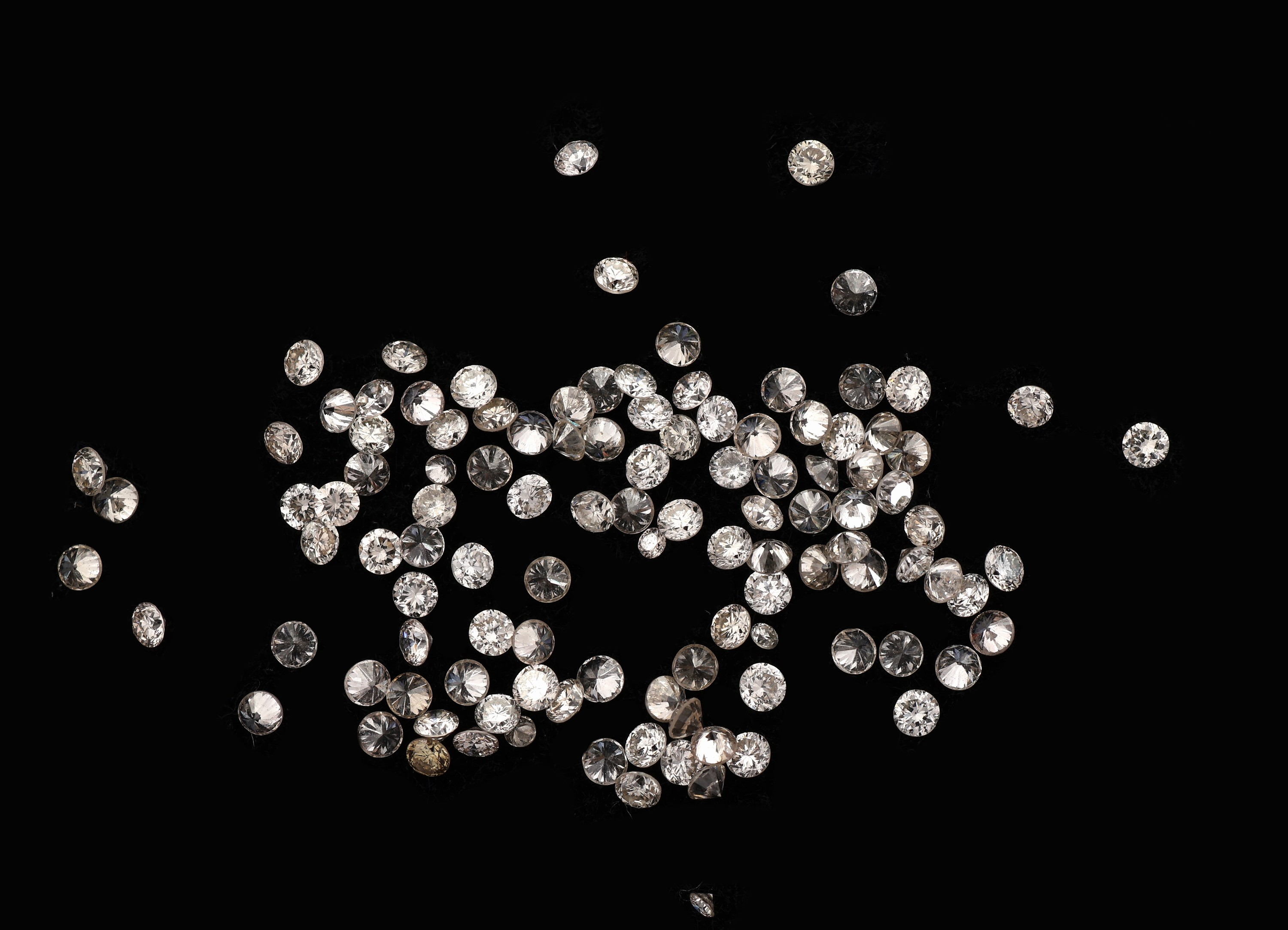 Detail a: Lot lose Brillanten, zus. ca. 1.00 ct Getönt/si, kalibriert ca. 1.25-1.30 mm