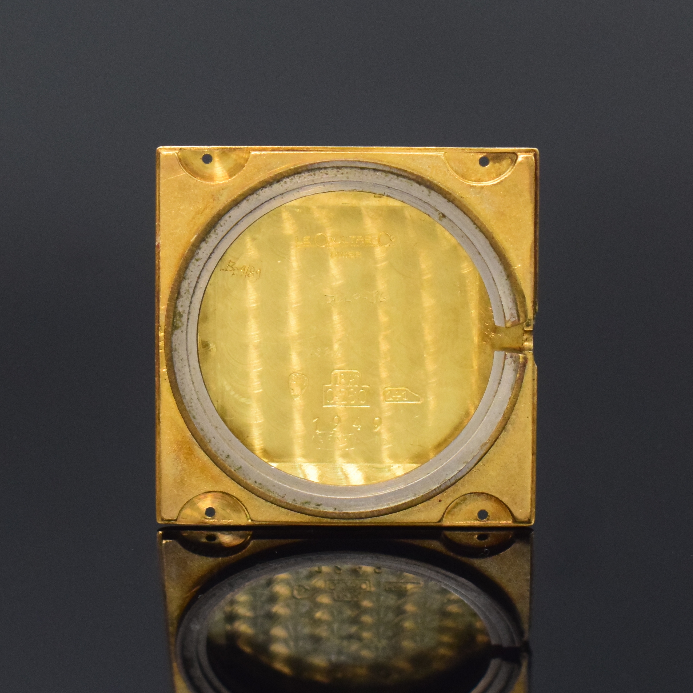 Detail e: LeCOULTRE Damenarmbanduhr in GG 750/000, Schweiz um 1960, Handaufzug, Boden 4-fach verschr., Schmuckkrone, rest. Zifferbl. m. 4 gelben Saphir-Ind., ...