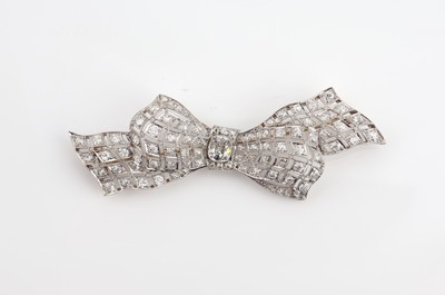 Image Platinum Diamond Bow Brooch, circa 1890/1900 Step back in time with this exquisite ...