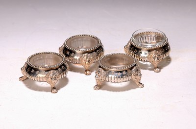 Image Four silver bowls with glass inserts, early 19th century, 13-solder silver, each with ...