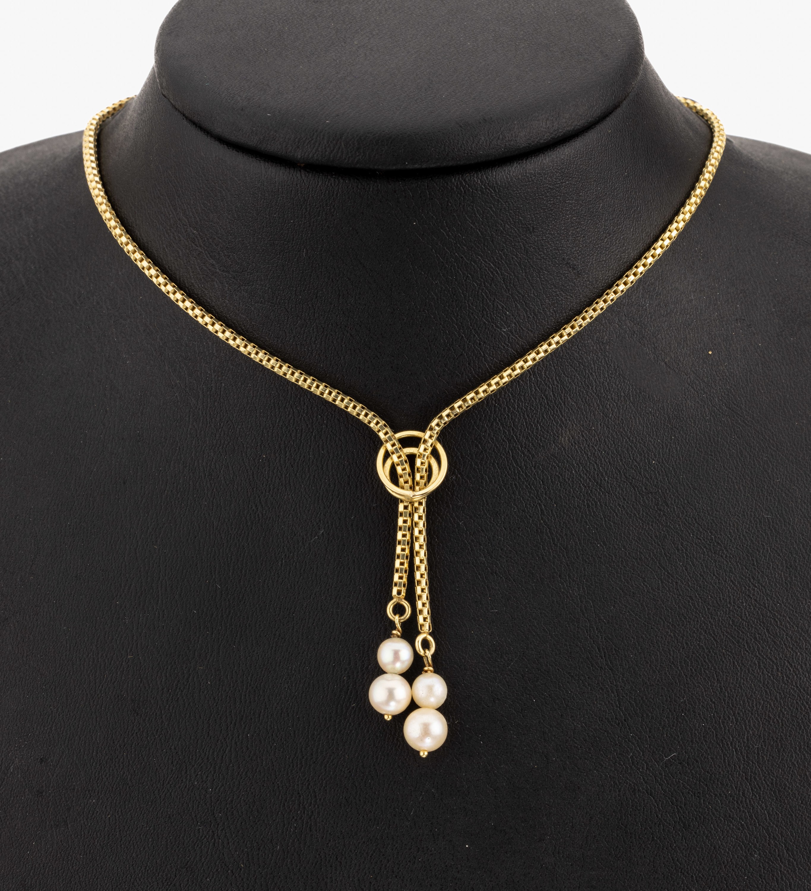14 kt Gold Perl-Collier, GG 585/000, Mittelteil mit 4 bewegl. abgehängten Akoyazuchtperlen, D. ca. 5.2-6.1 mm, L. ca. 44.5 cm, Federringschliesse, ...