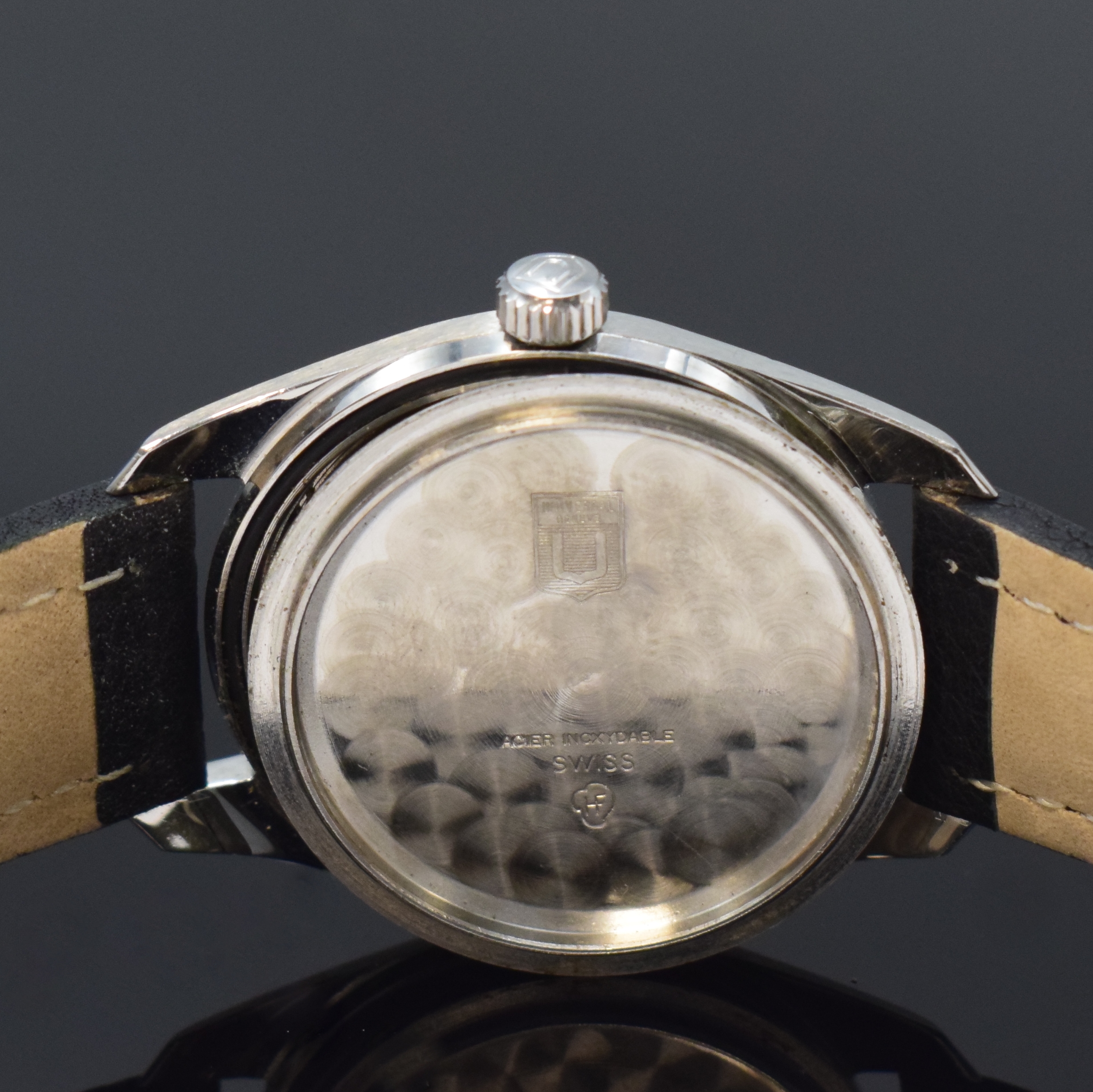 Detail e: UNIVERSAL GENEVE Polerouter Herrenarmbanduhr Referenz 869113/01, Schweiz um 1965, Automatik, Edelstahlgeh., Boden verschr., schwarzes Zifferbl. m. ...