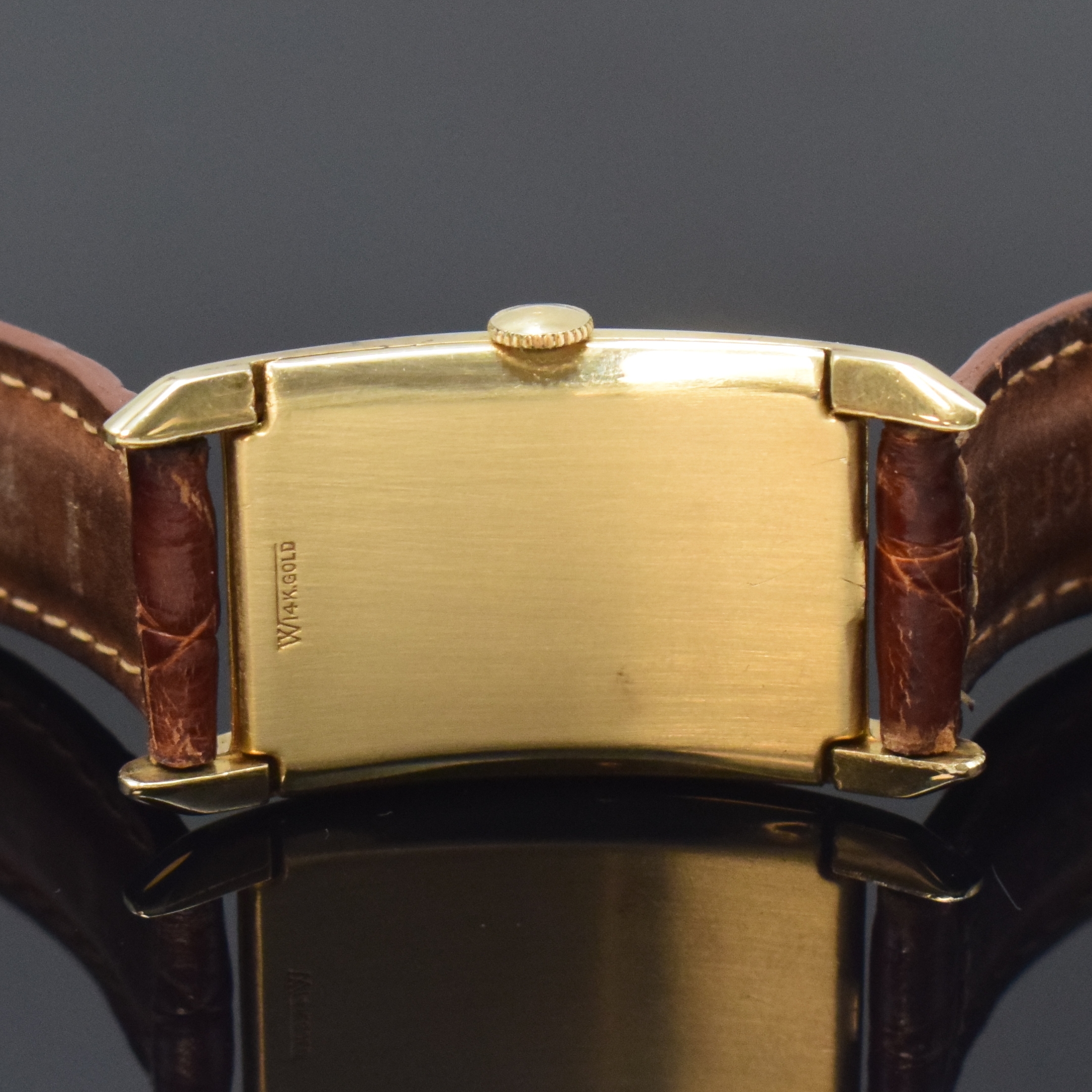 Detail c: GRUEN Curvex Armbanduhr in GG 585/000, Schweiz fürUSA um 1940, Handaufzug, Boden aufgedr., silb. Zifferbl. m. arab. Zahlen, gold. Zeiger, sign. Werk ...