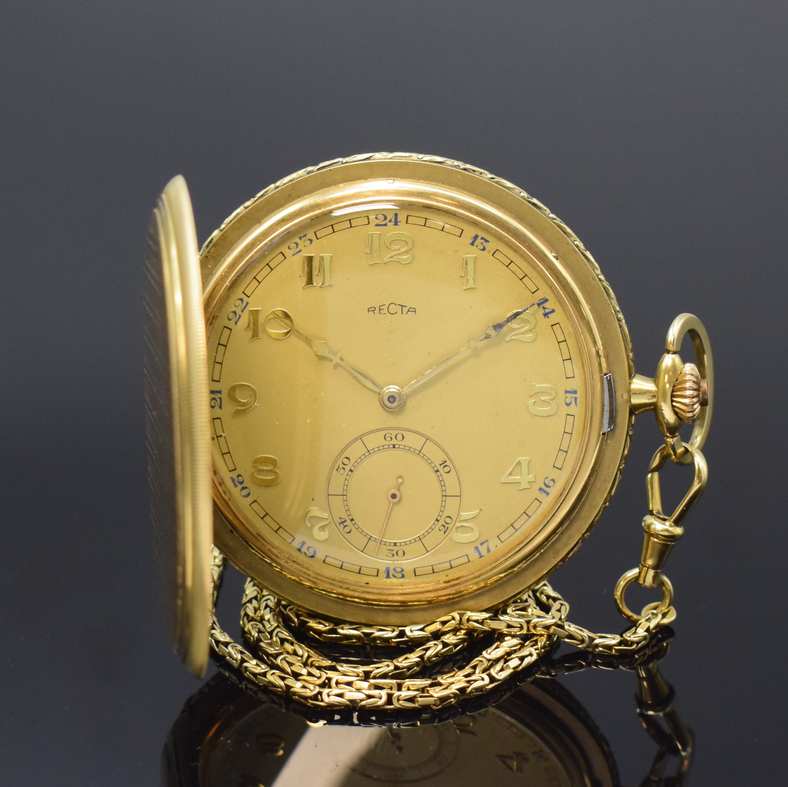RECTA Savonette in GG 585/000 mit Kette in GG 585/000, Schweiz um 1925, Geh. seitl. floral grav., Sprung- u. Rückdeckel m. Streifendekor, ...