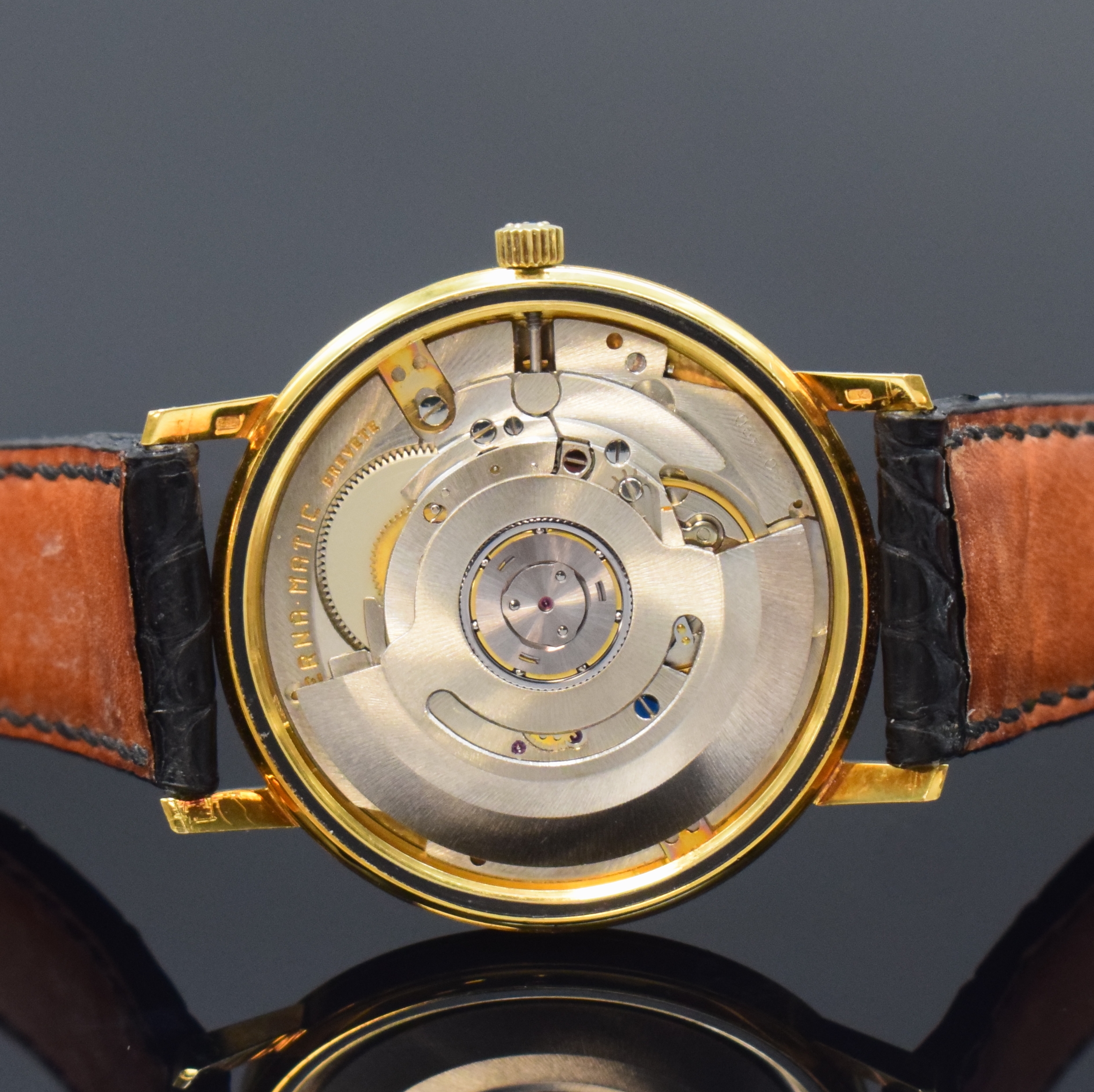 Detail e: ETERNA-MATIC 3000 Herrenarmbanduhr in GG 750/000 Referenz 746T, Schweiz um 1965, Automatik, Boden verschr., neutr. Lederband mit orig. verg. ...