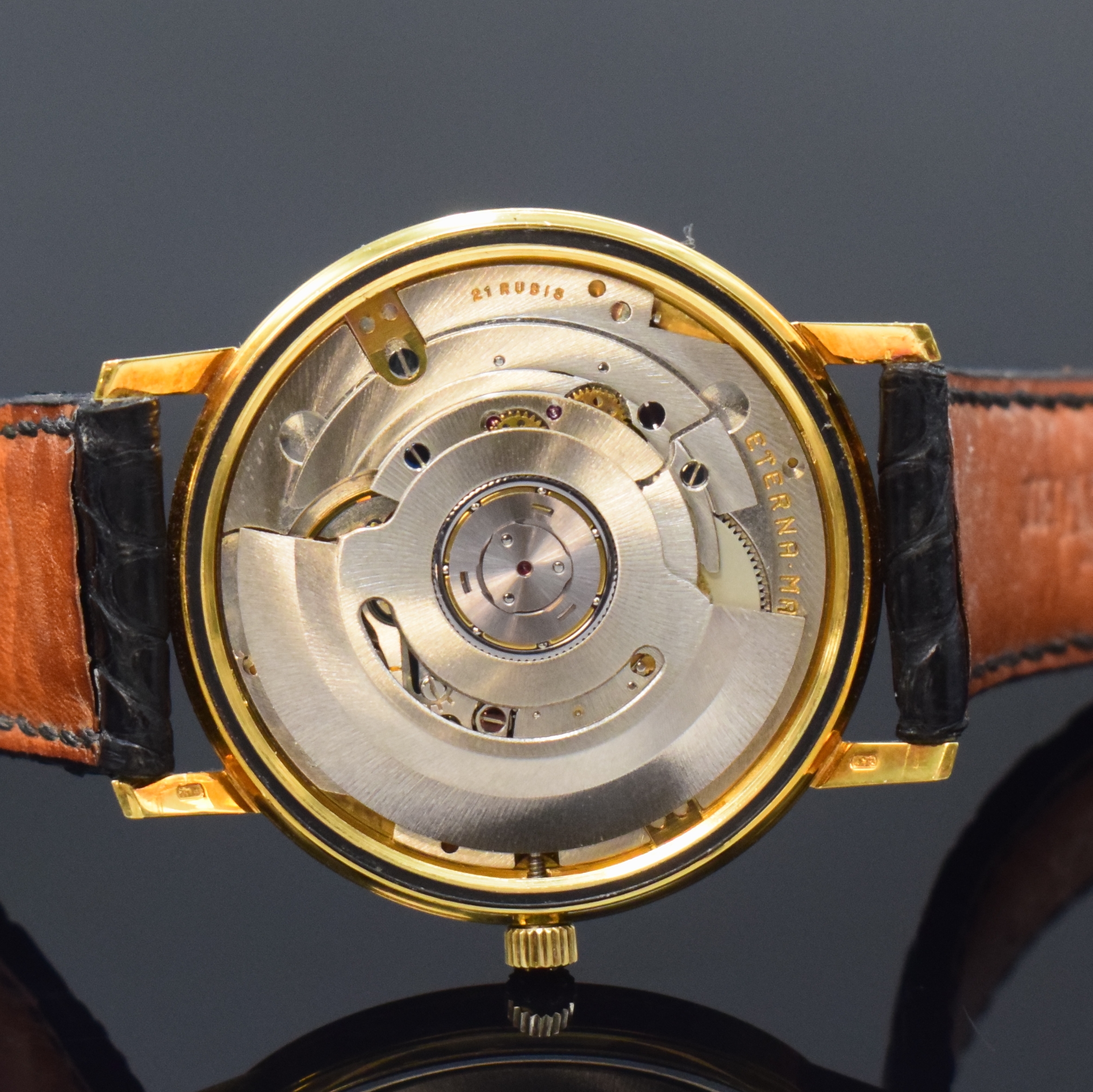 Detail f: ETERNA-MATIC 3000 Herrenarmbanduhr in GG 750/000 Referenz 746T, Schweiz um 1965, Automatik, Boden verschr., neutr. Lederband mit orig. verg. ...